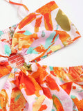 Close-up of floral ruched sweetheart top with tie straps