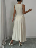 Back view of cream apricot midi dress with center seam and clean closure