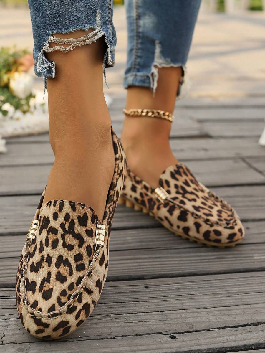 Elevate your casual wardrobe with these stunning leopard print loafers, expertly handcrafted for all-day comfort. The slip-on design features a sleek metal buckle accent that adds a touch of sophistication to any outfit. Perfect for fall and winter, these versatile sneakers transition seamlessly from weekend errands to relaxed social gatherings. The soft, cushioned interior ensures your feet stay comfortable throughout the day, while the eye-catching leopard pattern makes a bold style statement. 