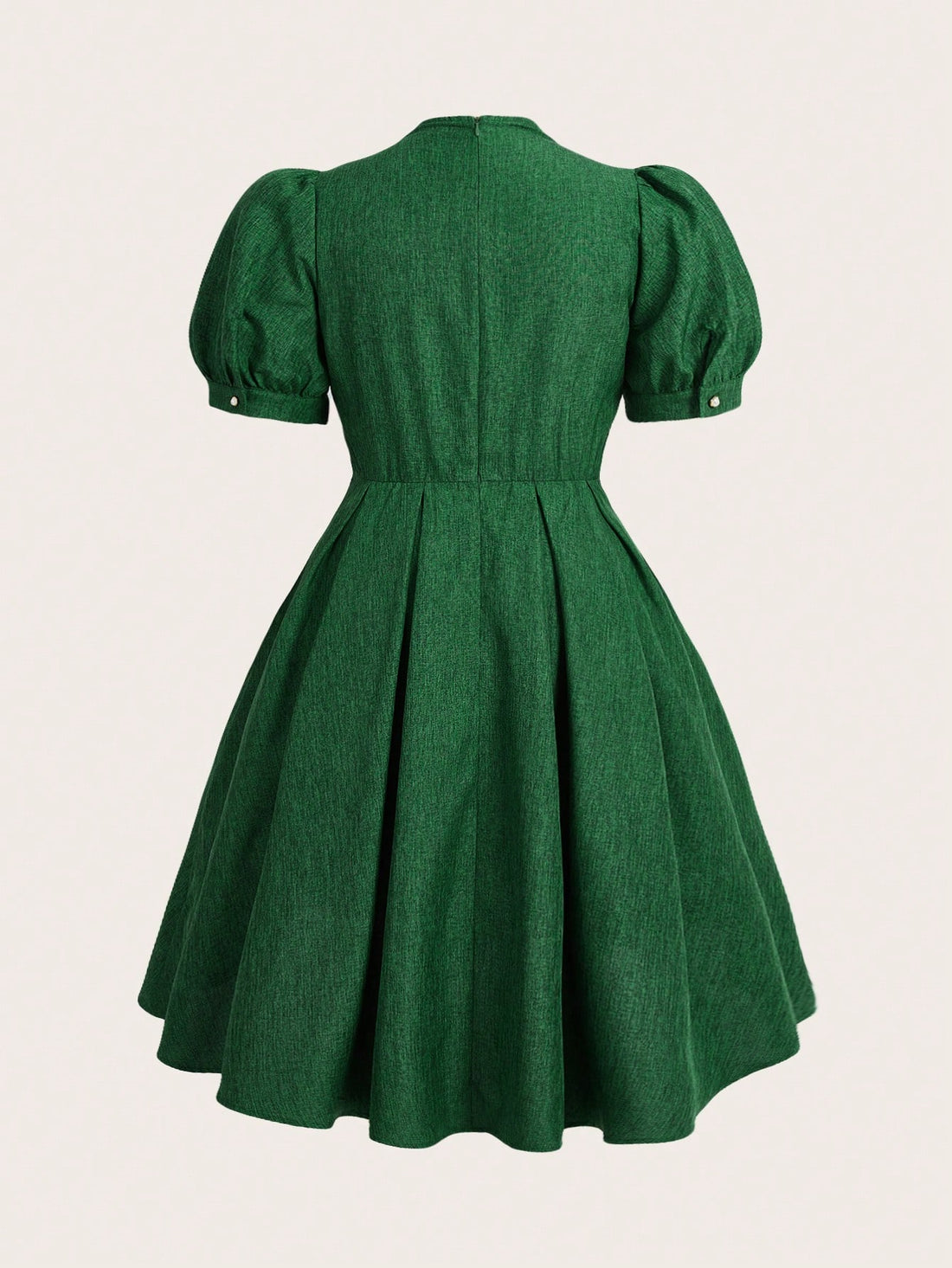 Unleash your inner vintage charm with our Plus Size V-Neck Dress! The twist front adds a unique twist (see what we did there?) to this classic silhouette, while the puffed sleeves add a touch of whimsy. Perfect for spring and summer, this dress will bring elegance to any occasion. Shop now!