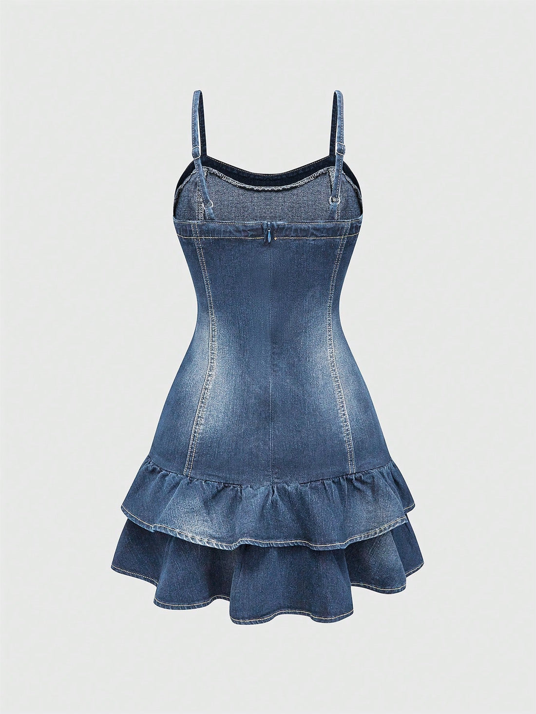 Expertly crafted and charming, this Kawaii Denim Dress features delicate spaghetti straps and a playful ruffle hem. Made from high-quality denim, it's perfect for any occasion and exudes a youthful and modern style. Elevate your wardrobe with this must-have piece and stand out with its unique and stylish design.