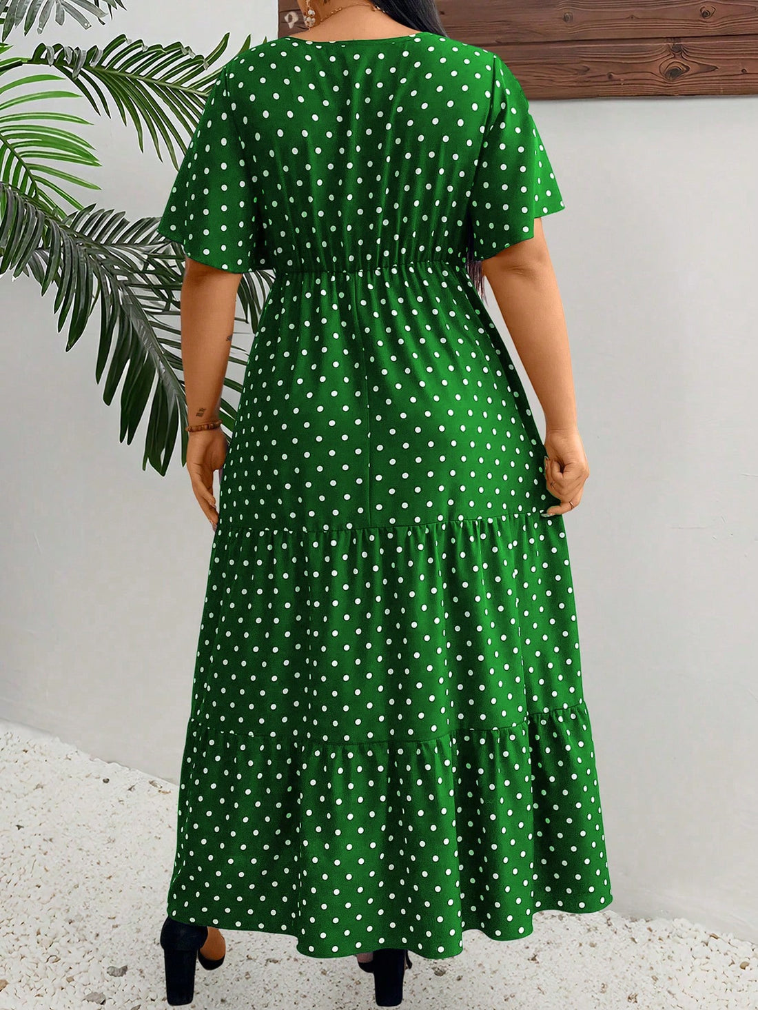 Add some playful polka dots to your summer wardrobe with this stunning V-neck dress! The elegant ruffles and short sleeves add a touch of whimsy to this plus size outfit, perfect for Christmas or any occasion. Stay chic and comfortable with this stylish maxi dress.