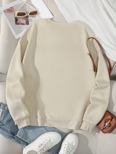 Cozy Chic: Women's Casual Drop Shoulder Sweatshirt with Fun Slogan and Bow Print