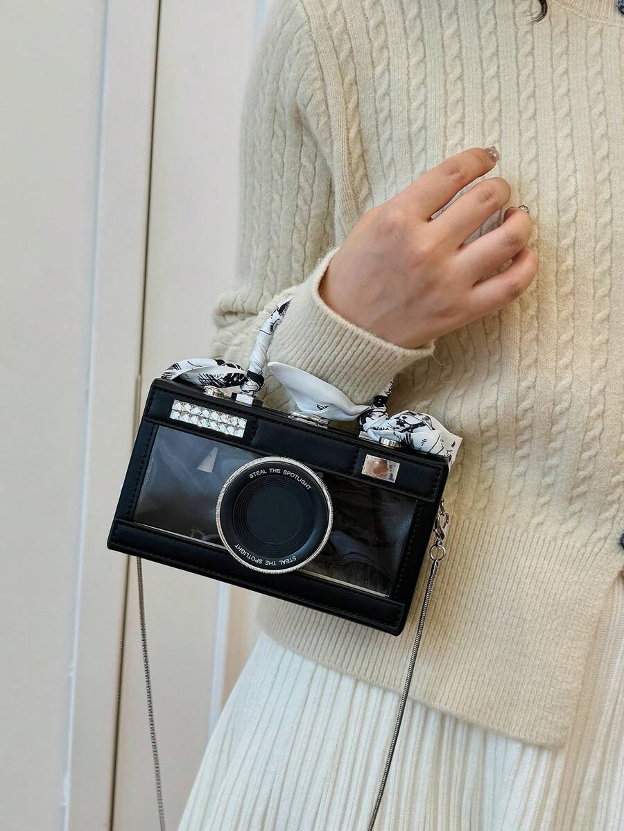 Step out in style with the Chic Retro Camera Bag, a playful blend of vintage charm and modern function. This versatile crossbody wallet keeps your essentials close and your hands free, making errands or nights out a breeze. Its compact design perfectly complements any outfit while adding a unique retro twist. Feel confident and ready for anything with this stylish must-have accessory by your side.