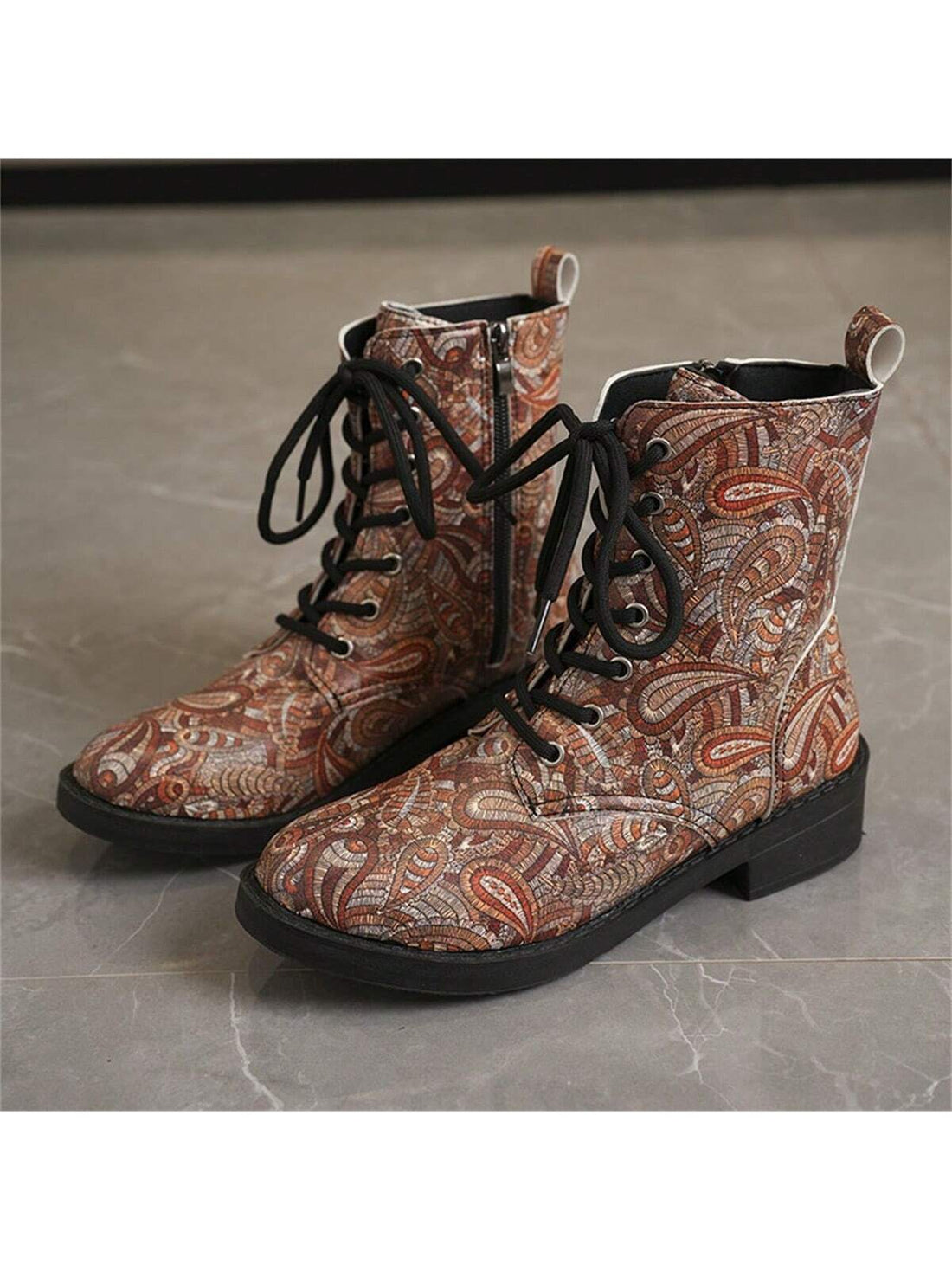 Experience style and stability with our Chic Vintage Lace-Up Short Boots. The contrast color block provides a unique touch while the slip-resistant thick heels ensure safe and comfortable wear all day. Elevate your fashion game with these lace-up boots.