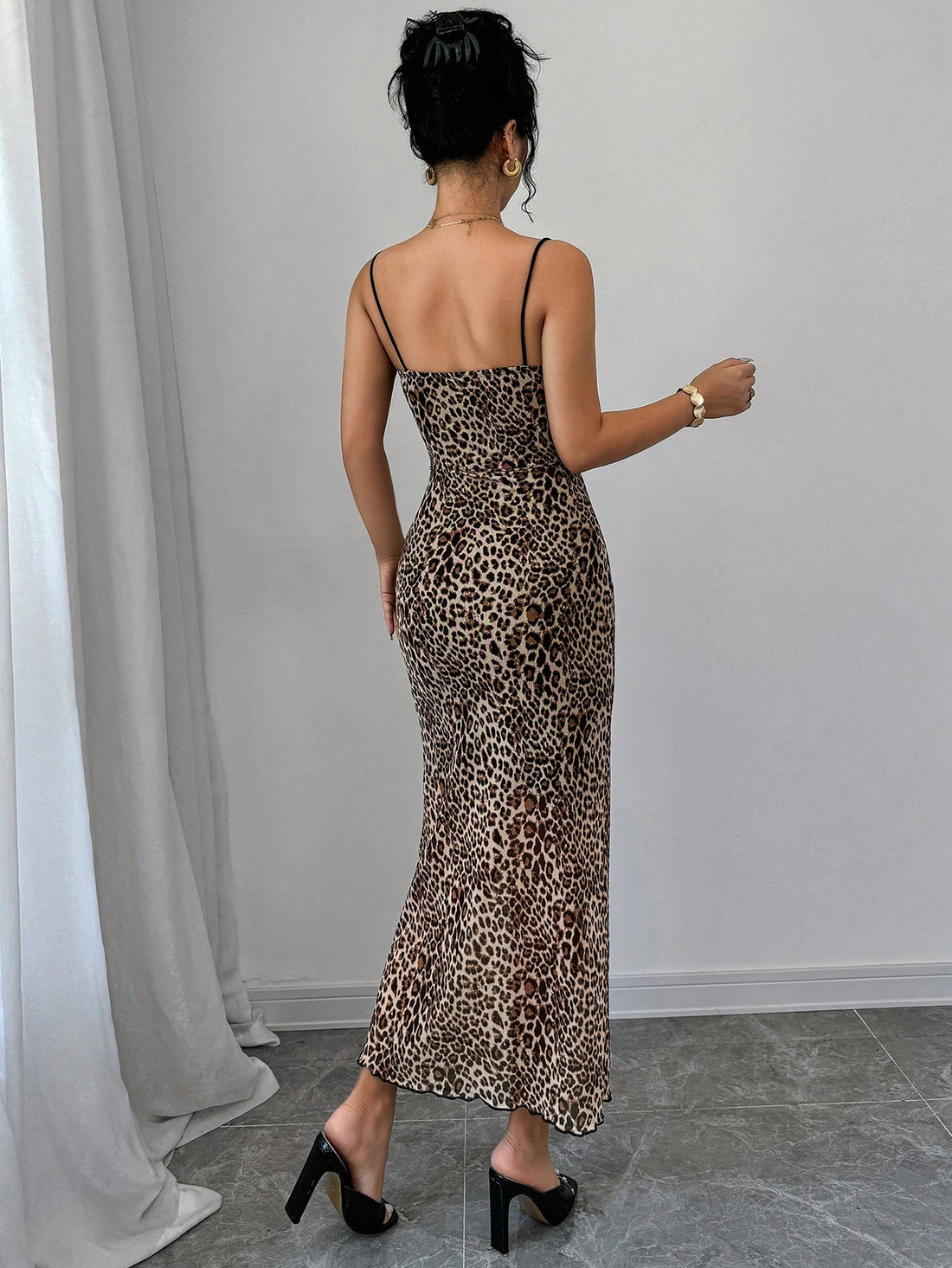 Turn heads in this stunning leopard print lace midi bodycon dress—the perfect blend of wild and romantic. Featuring delicate lace detailing and a flattering fitted silhouette, this versatile piece transitions effortlessly from date night to everyday chic. The midi length offers elegant coverage while the bold leopard pattern adds just the right amount of sass. Whether you're dressing up for a special occasion or elevating your casual wardrobe, this dress is your new go-to for looking fabulous.