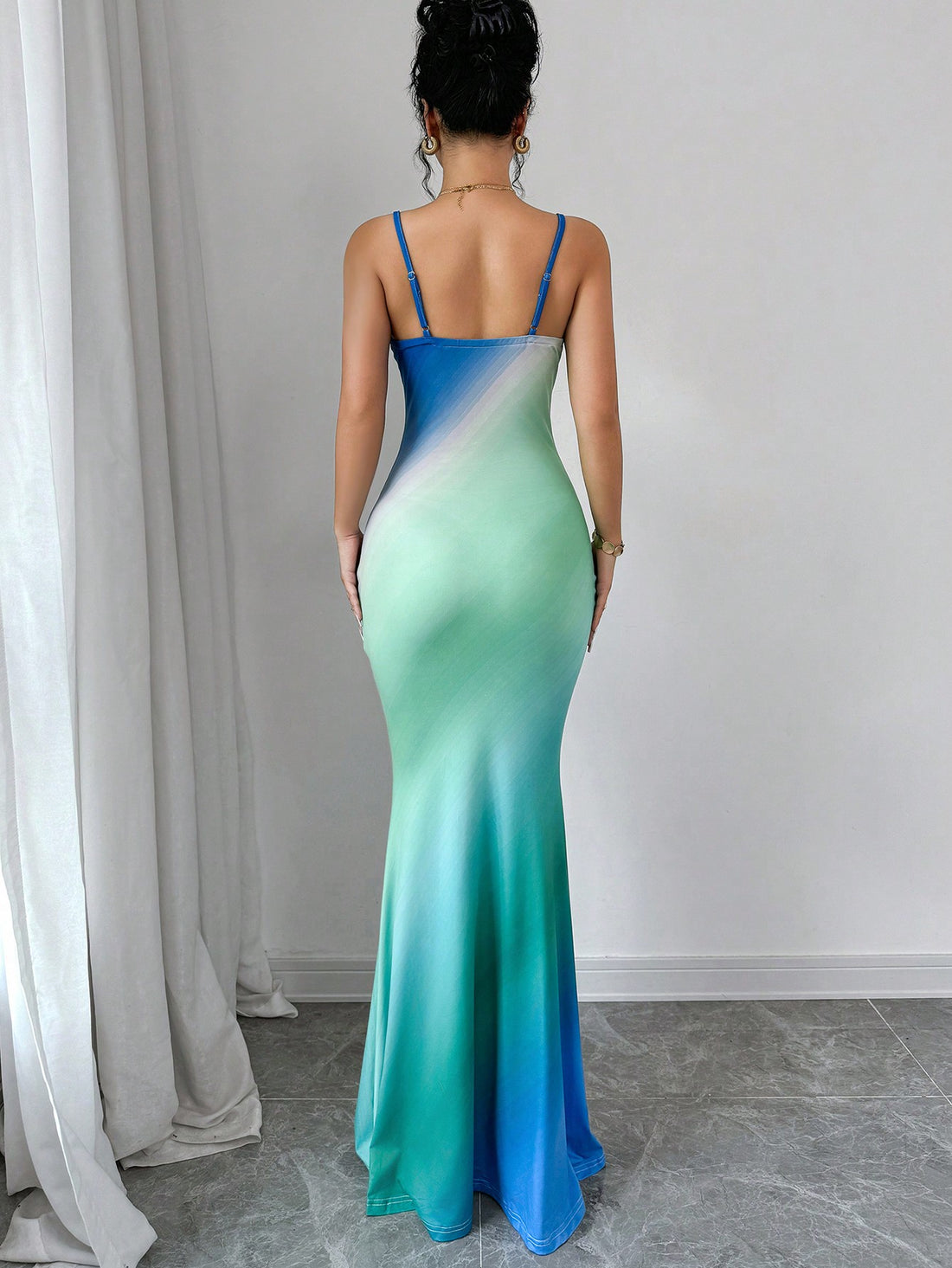 Step into summer with style in our Chic Ombre Fishtail Dress! This elegant dress boasts a unique ombre design that transitions from light to dark, adding a touch of sophistication to your wardrobe. Perfect for any stylish woman looking to make a statement.