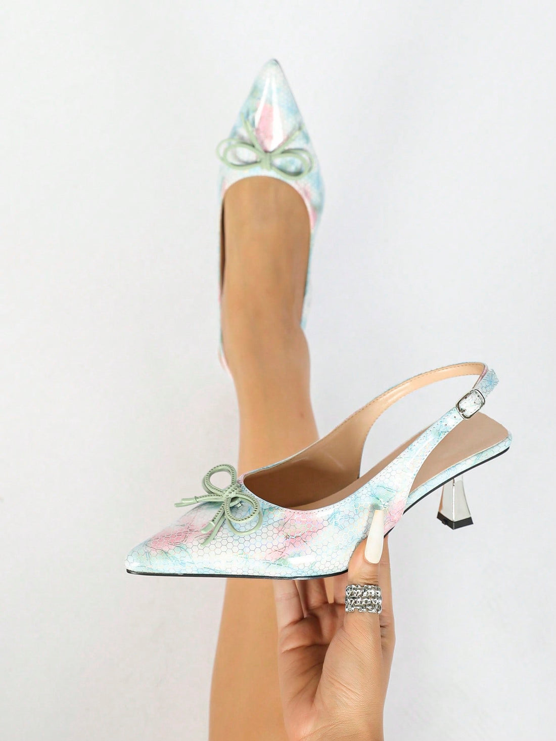 Elevate your style with our Chic Pointed Toe Slingback High Heels - the perfect versatile pumps for every occasion. With a sleek pointed toe design and secure slingback strap, these heels are both fashionable and functional. Transform any outfit into a polished and elegant look.