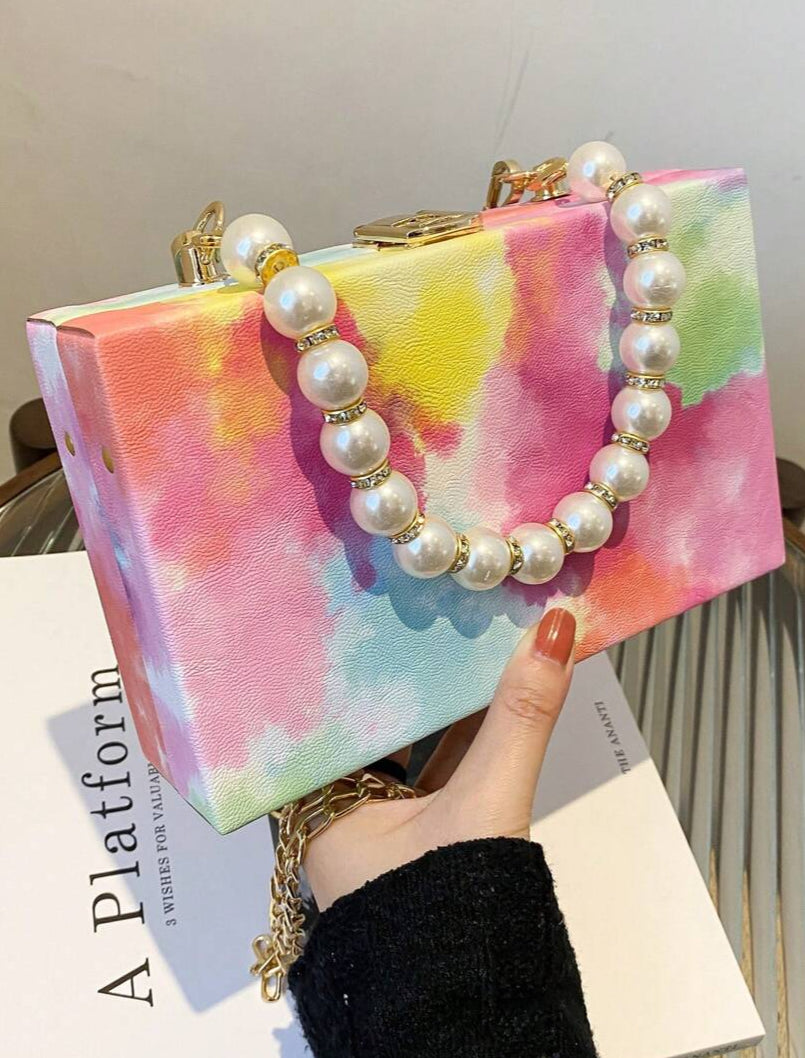 Make waves with this Elegant Sky Ocean crossbody bag, where art meets fashion! Featuring a dreamy oil painting design, sparkling rhinestones, and delicate faux pearls, it’s perfect for adding a splash of charm to any outfit. Lightweight and fun, this bag is the ideal gift to brighten a woman’s day while carrying essentials in style.