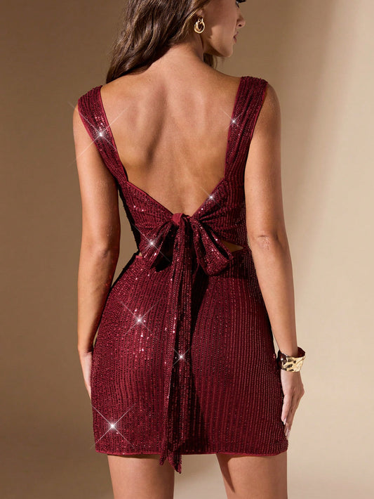 Radiant Elegance: Sequined Draped Neckline Dress with Bow Back and Slit