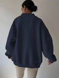 Back view of navy blue oversized sweatshirt with wide rib-knit hem and cuffs