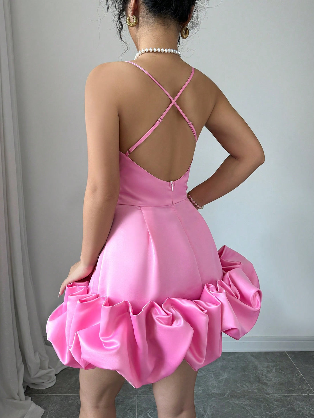 Stay cool and chic this summer with our Criss-Cross Backless Ruffle Hem A-Line Dress. The perfect dress for any occasion, its figure-flattering A-line silhouette and delicate ruffle hem will make you feel effortlessly stylish. The criss-cross back adds a touch of intrigue, making it the perfect summer statement piece.