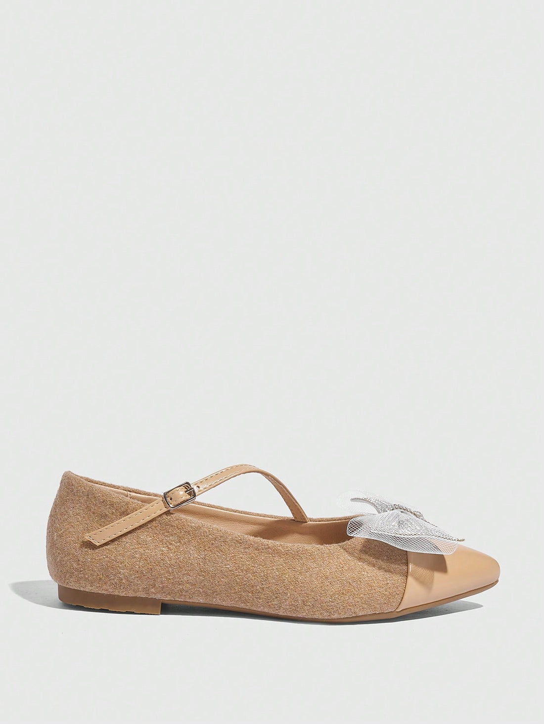 Elevate your everyday elegance with these Chic & Cozy slip-on flats. The pointed toe design and apricot bow detail provide a sophisticated touch, while the cozy fit ensures all-day comfort. Perfect for any occasion, these flats effortlessly combine style and comfort for a chic and polished look.