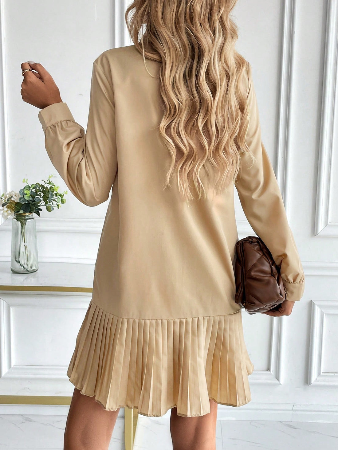 Look effortlessly elegant in this Casual Button-Up Shirt Dress with Foldable Collar. Made to make dressing up a breeze, this dress combines style and convenience with its button-up design and foldable collar. Perfect for any occasion, this dress adds a touch of versatility to your wardrobe.