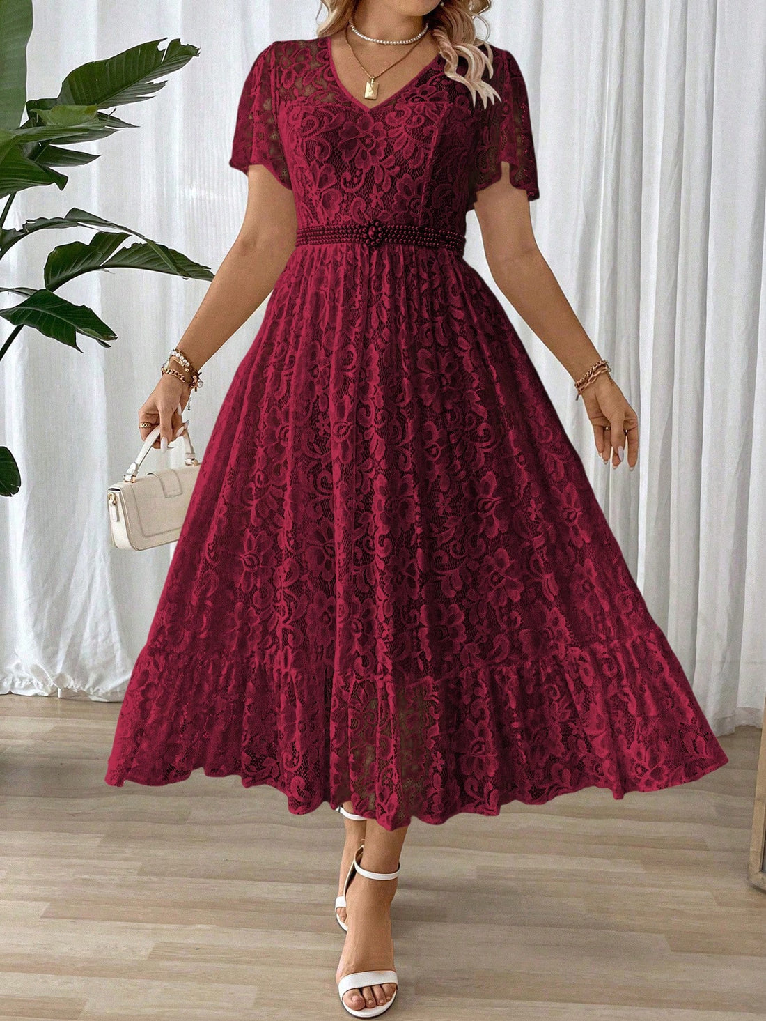 Twirl into wedding season with our stunning plus size maxi dress! This summer showstopper features a flattering V-neck that's just the right amount of flirty, while the lace ruffle hem adds a touch of whimsy to your every step. Perfect for dancing the night away or sipping champagne at summer celebrations – this elegant number ensures you'll turn heads without trying!