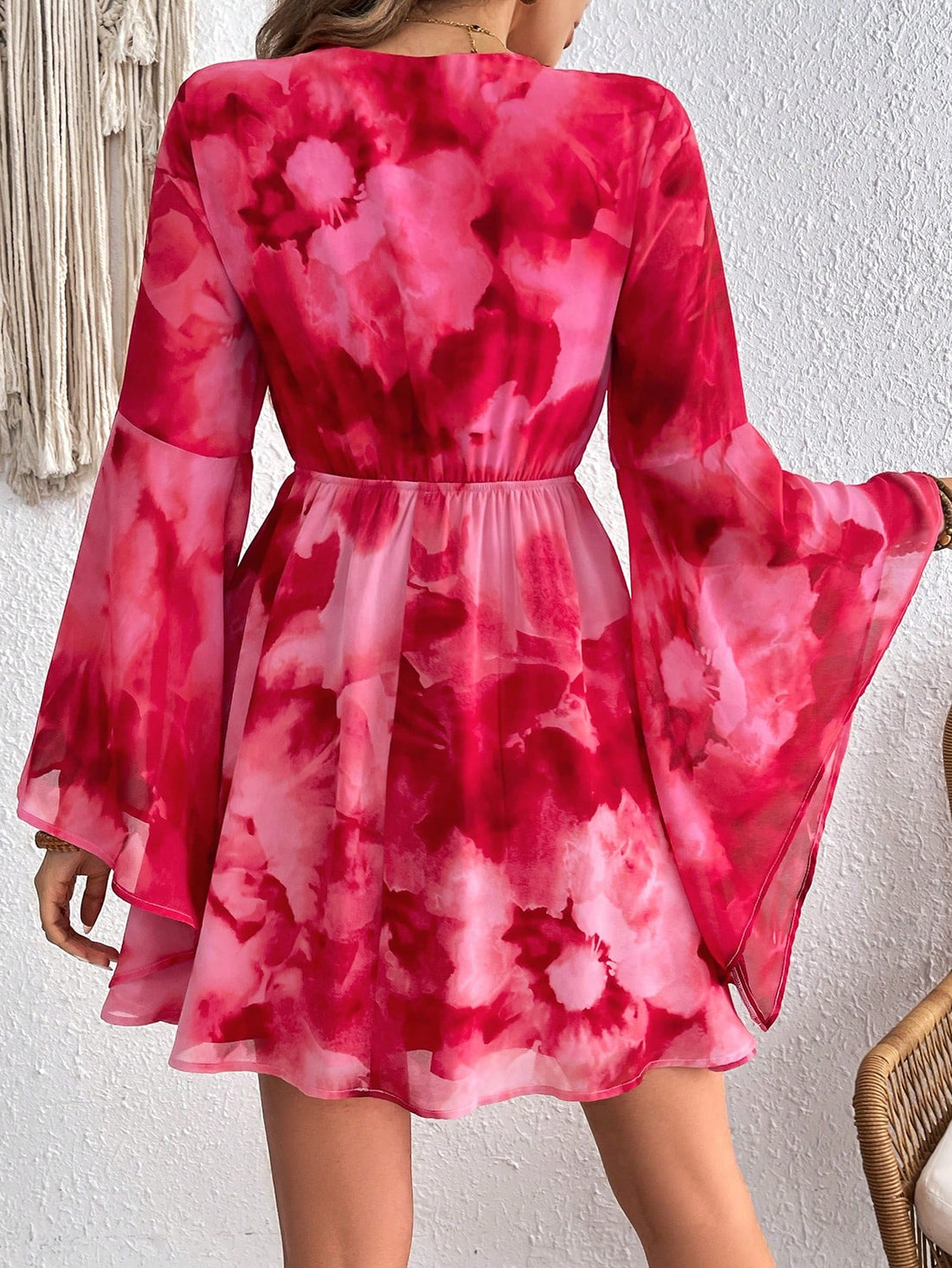 Step into summer with this playful floral print mini dress featuring an asymmetrical hem and long sleeves. Its breezy design keeps you comfortable while the unique cut adds a fun, flirty vibe—ideal for vacation days or casual outings. Embrace effortless style and let your look bloom wherever you go!