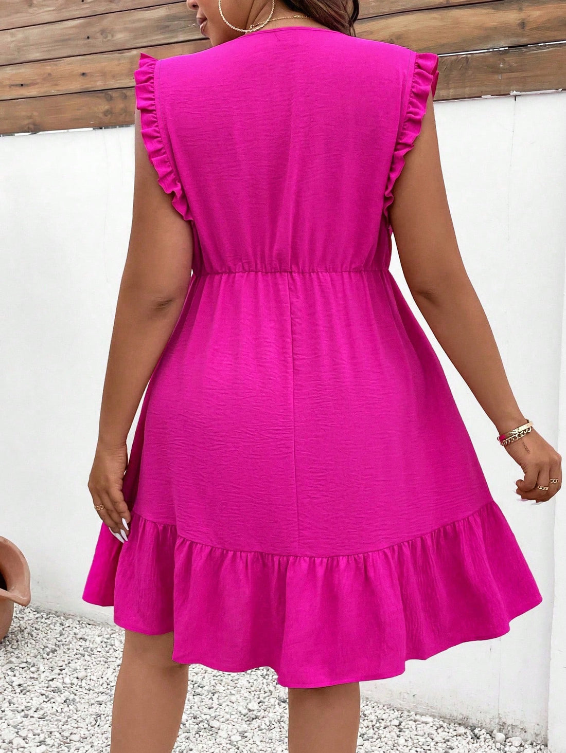 Get ready to turn heads on your next vacation with this Plus Size V-Neck Short Flutter Sleeve Dress! The perfect mix of style and comfort, this dress is designed for women of all sizes. Its flutter sleeves add a playful touch, making it the perfect choice for any vacation destination.