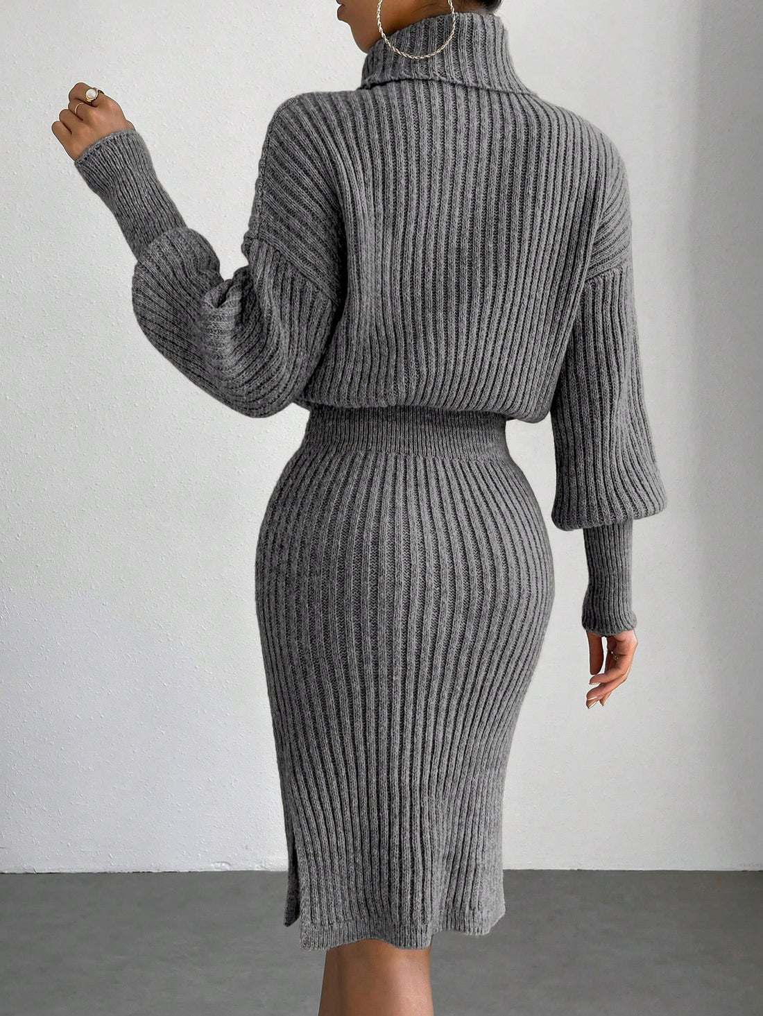 Stay cozy and stylish in our Chic Elegance Turtleneck Sweater Dress. Made with a slim-fit design and solid color, it's perfect for the cooler seasons. With a turtleneck to keep you warm and chic, it's the perfect addition to your autumn and winter wardrobe.