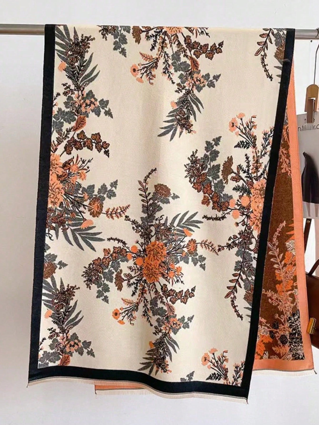 This Cozy and Chic reversible scarf is the perfect accessory for women looking to stay warm in style. Made with dual-use functionality, it can be worn as a traditional scarf or easily converted into a wrap. With its versatile design and high-quality material, this scarf is a must-have for any fashion-forward individual.