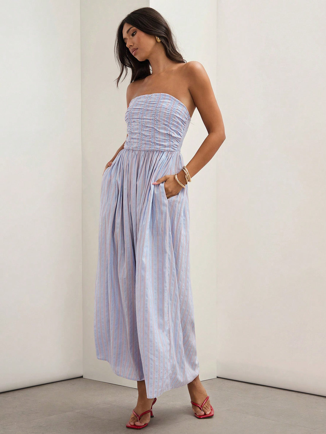 Get ready to rock those summer vibes with our Chic Summer Vibes dress! This playful and stylish striped pleated dress is perfect for any occasion. With a strapless design, you'll stay cool and comfortable while making a statement. Be bold, be stylish, and be yourself with our Chic Summer Vibes dress!