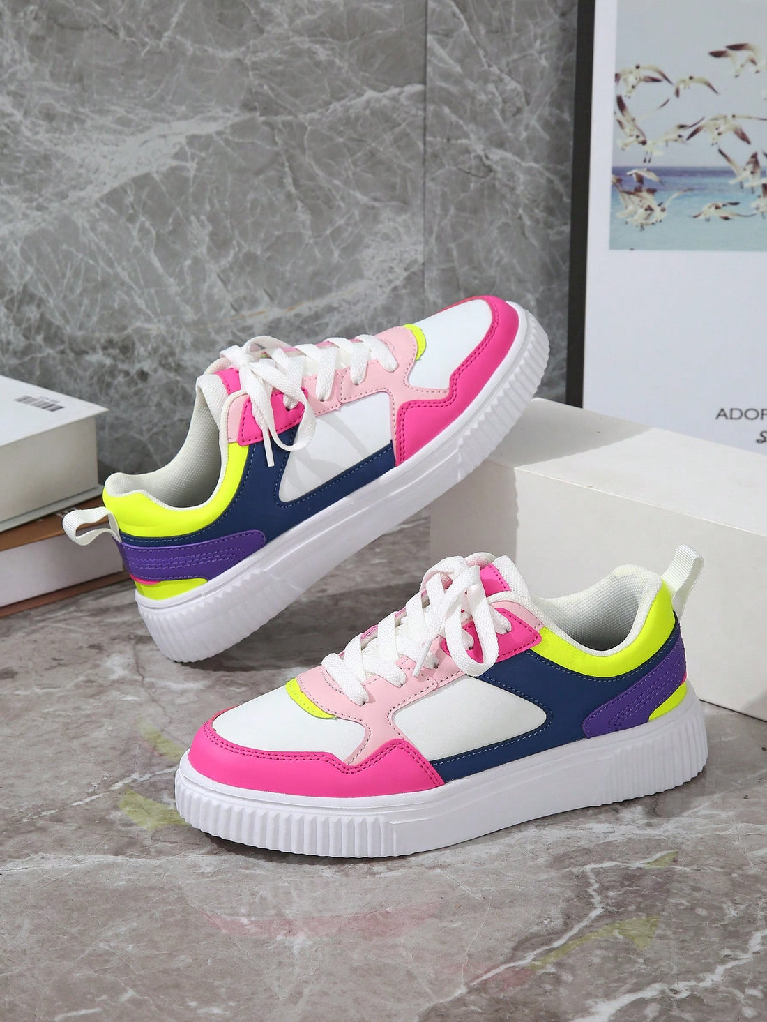 Step into style with these eye-catching multi-color gradient sports shoes designed for women who refuse to blend in. Featuring a vibrant ombre effect that transitions across the upper, these lace-up kicks deliver comfort for all-day wear, whether you're hitting the skate park or dancing at your next party. The cushioned thick sole provides reliable support and shock absorption, making them perfect for active lifestyles. Durable construction meets bold fashion in one playful package that'll have everyone ask