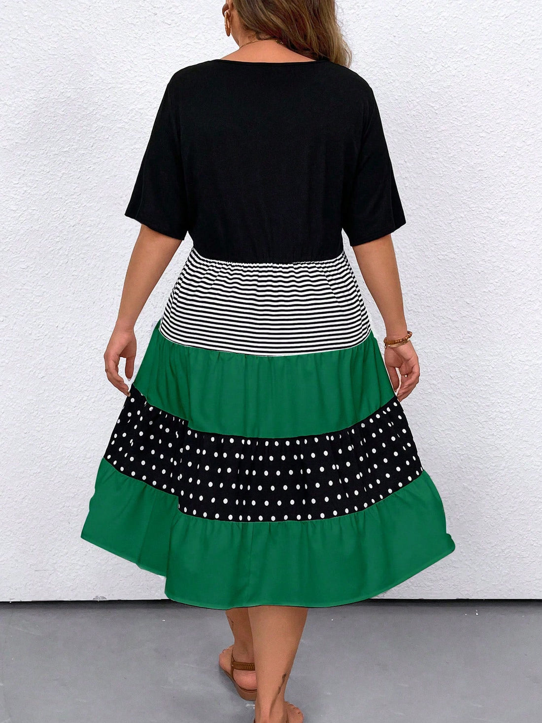 Step into summer with style and comfort in our Chic & Comfy Plus Size Summer Dress. The polka dot striped pattern adds a playful touch to the loose fit design, while the short sleeves keep you cool on those hot days. Look chic and feel comfy all season long!