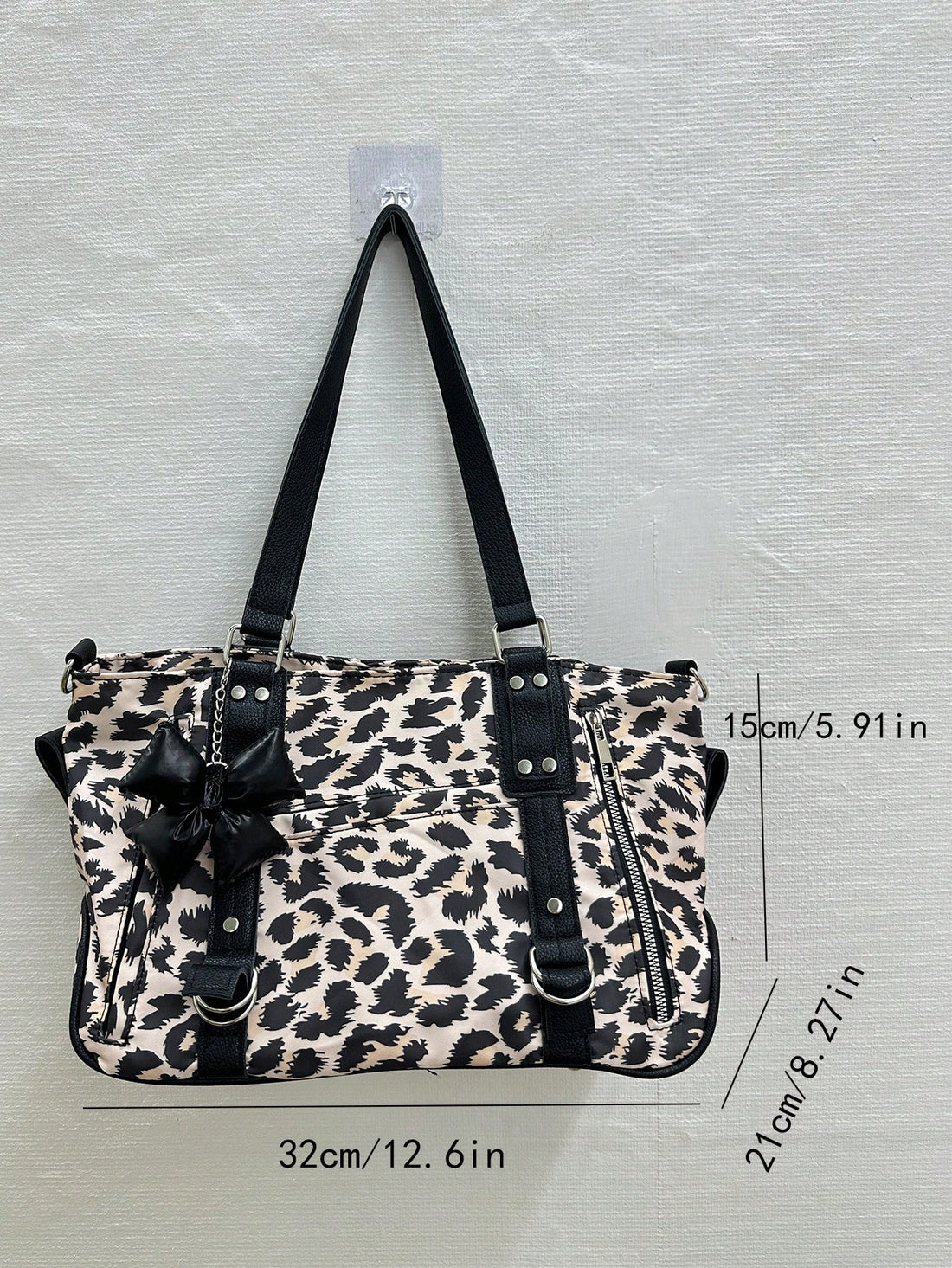 Introducing the Cute Motorcycle Design Shoulder Bag: perfect for students looking for a trendy and commuter-friendly option. This bag features an eye-catching motorcycle design and is specifically designed to meet the needs of students. Stay stylish and organized on the go with this must-have accessory.