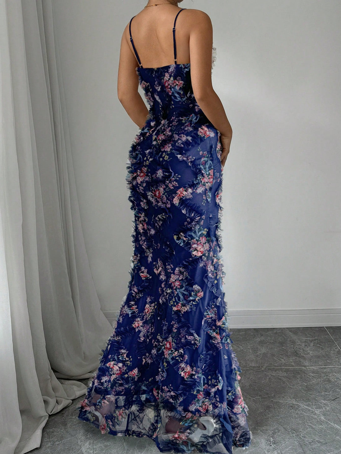 Get ready to turn heads in our Elegant Elenzga Women's Maxi Dress! With a chic ruffle hem and delicate spaghetti straps, this dress is perfect for any special occasion. Made with quality materials, it will keep you comfortable and stylish all day. Definitely an elegant must-have!