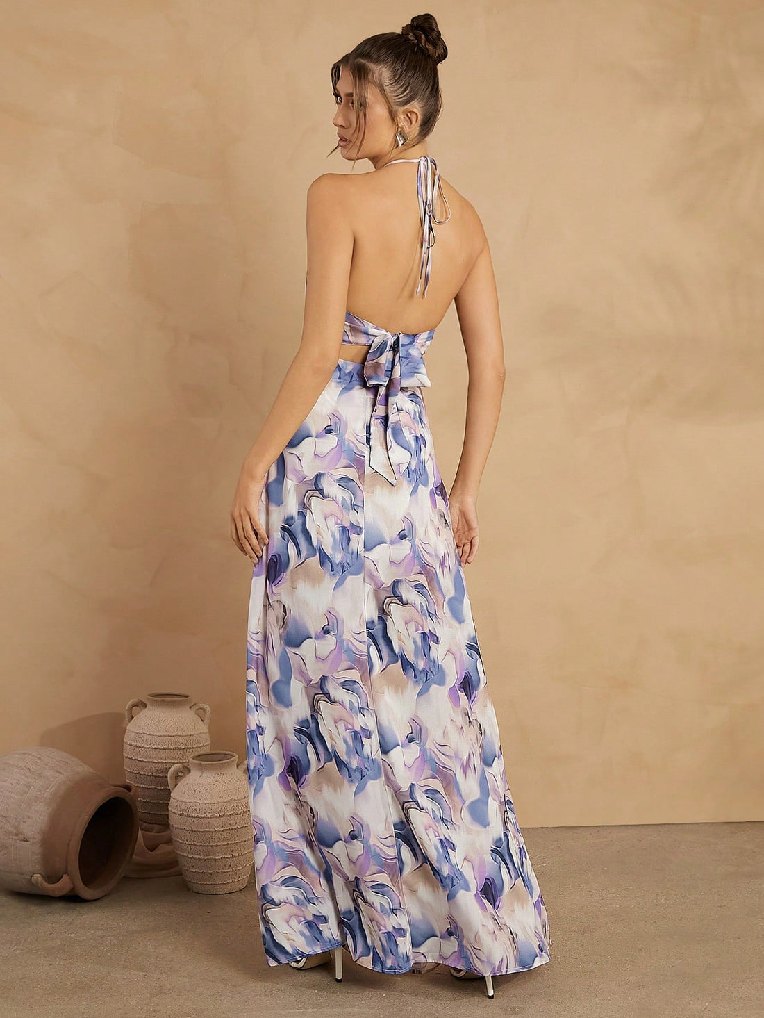 Be the envy of every vacation with our Chic All-Over Print Halter Backless Sleeveless Dress! This dress is perfect for casual days, featuring a playful print and a backless, halter design. Say goodbye to boring outfits and hello to effortless style. (No more #ootd stress!)