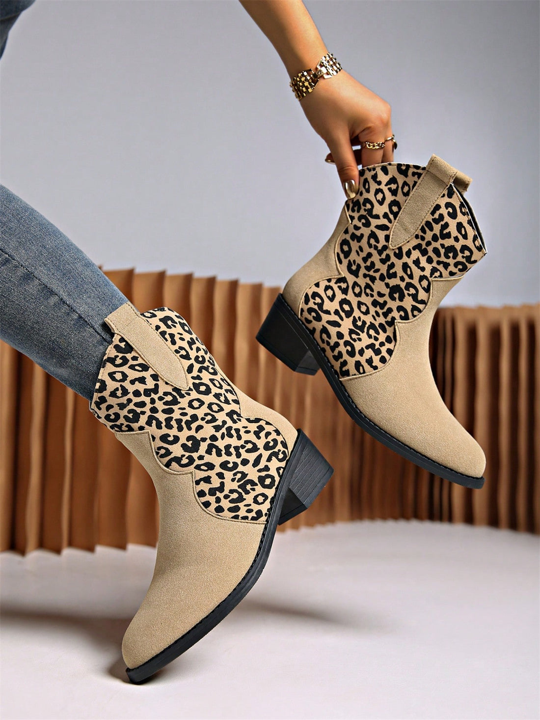 Upgrade your wardrobe with these chic leopard print slip-on short boots. With a versatile Western style and superior comfort, they are perfect for any occasion. Stay trendy and comfortable with these stylish boots.