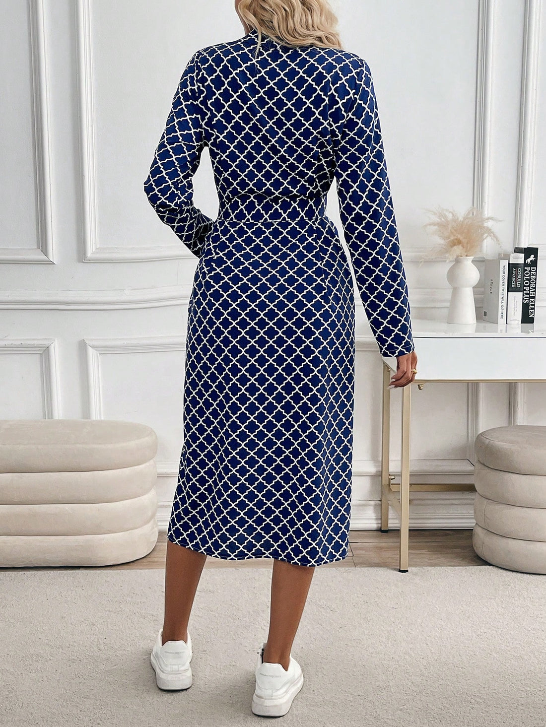 Effortlessly stylish and oh-so-chic, this navy blue plaid dress will become your new go-to favorite. Featuring convenient pockets and roll-up sleeves, this dress offers both fashion and function. Perfect for any occasion, this dress will keep you on-trend and looking fabulous.