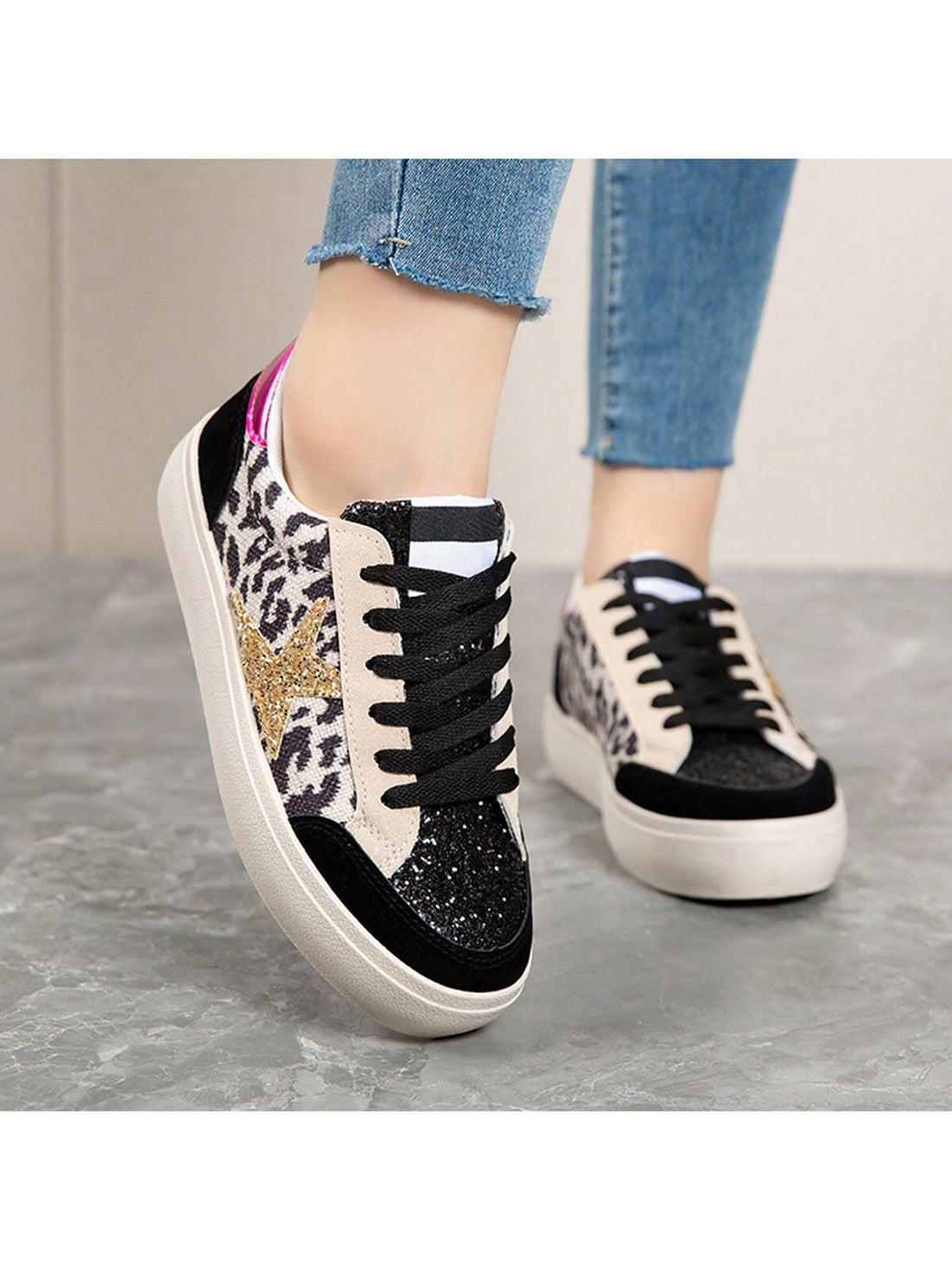 Introducing our Sparkly Printed Casual Sneakers for Women. Combining style and functionality, these anti-slip flat shoes are designed for the fashion-forward woman. With a sparkly print, you can make a statement while ensuring stability and comfort. Perfect for any casual occasion.