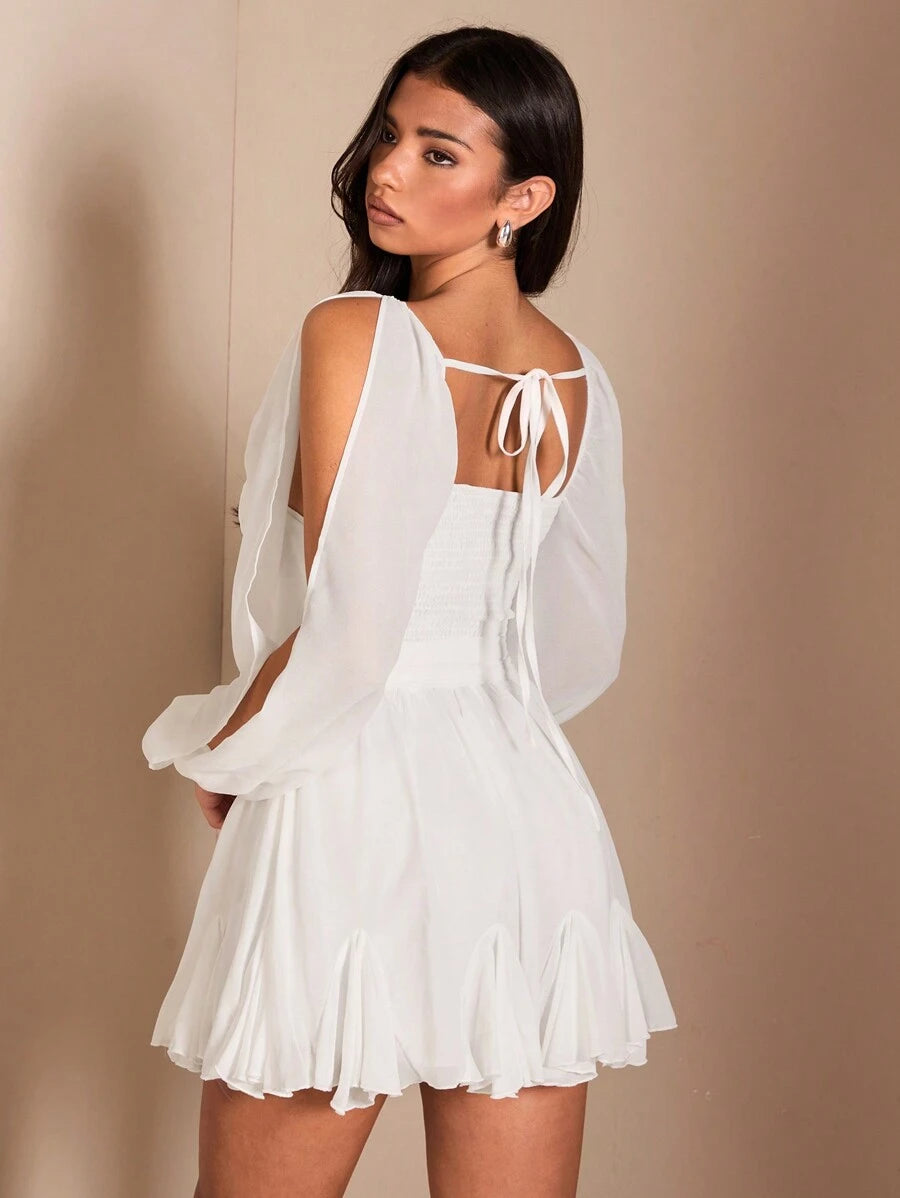 Back view white chiffon mini dress with tie-back neckline shirred back and sheer split sleeves