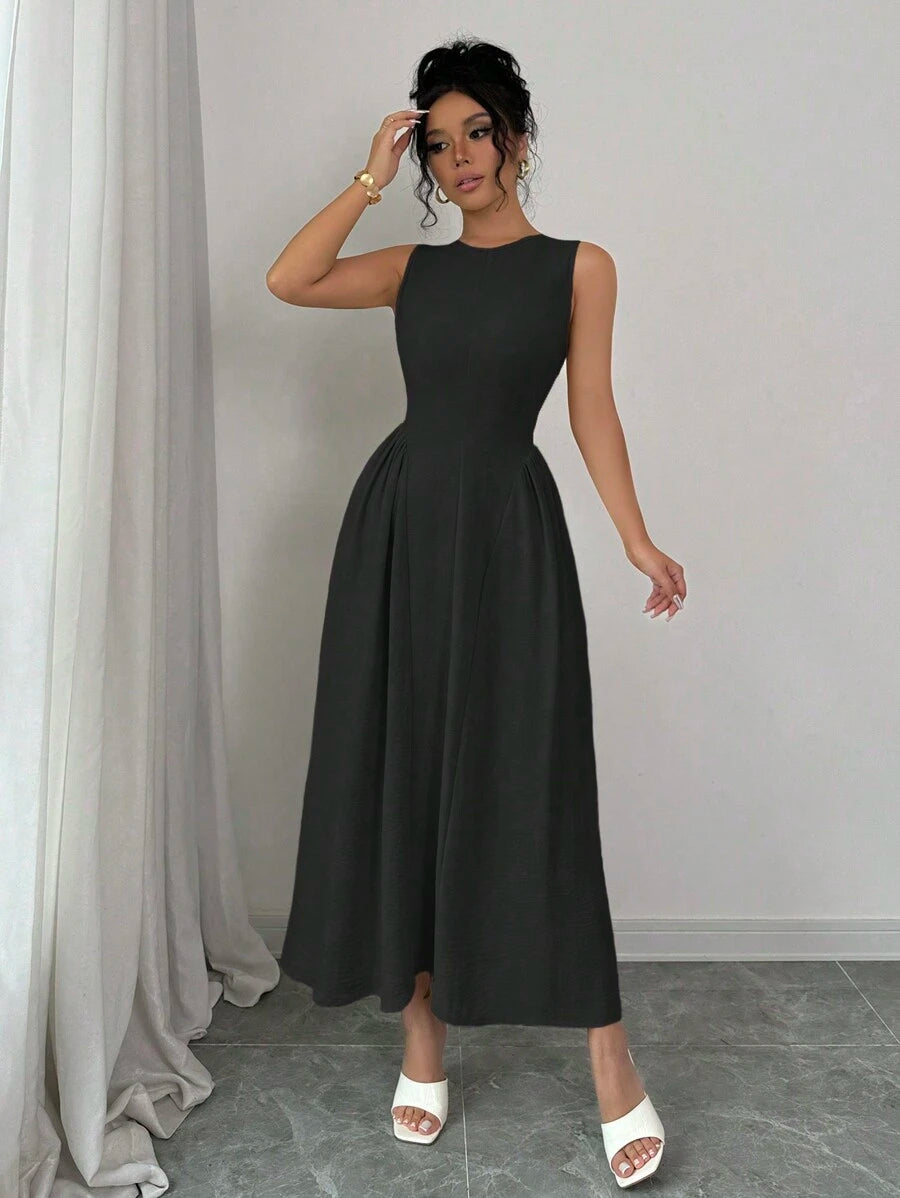 Front view of black sleeveless midi dress with round neck and gathered skirt