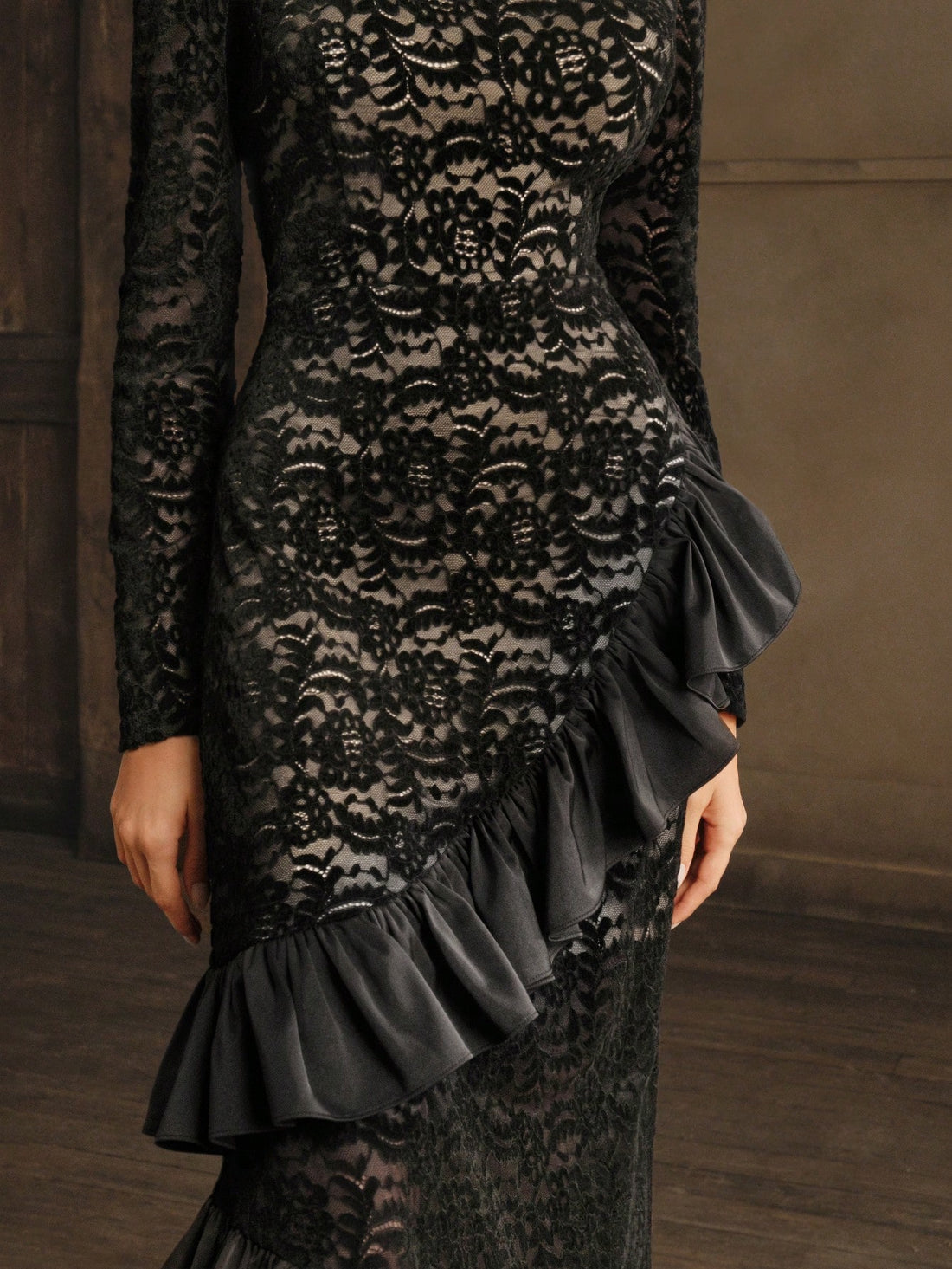 Step into the spotlight with this Elegant High Neck Lace Dress, featuring a playful asymmetric ruffle hem that adds a flirty twist to classic sophistication. The long sleeves and delicate lace create a chic silhouette perfect for making a fashion statement at any event. Embrace your inner charm and let this dress do the talking!