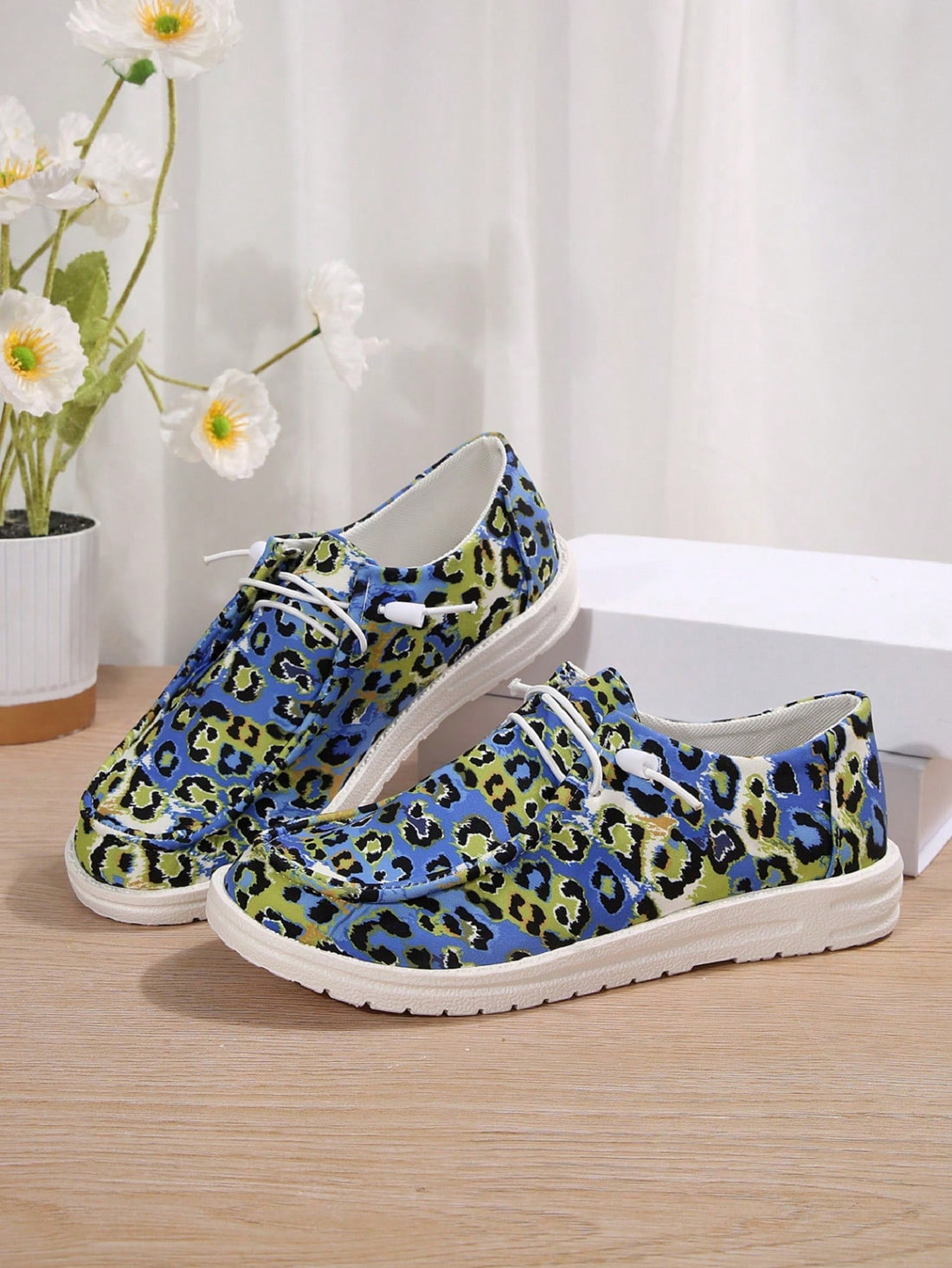 Introducing our Wild and Stylish Women's Leopard Print Lace-Up Sneakers, perfect for adding a fierce touch to your Halloween ensemble. With their trendy leopard print design and comfortable lace-up style, you'll be sure to turn heads and stay comfortable all night long. Get wild this Halloween with our stylish sneakers.