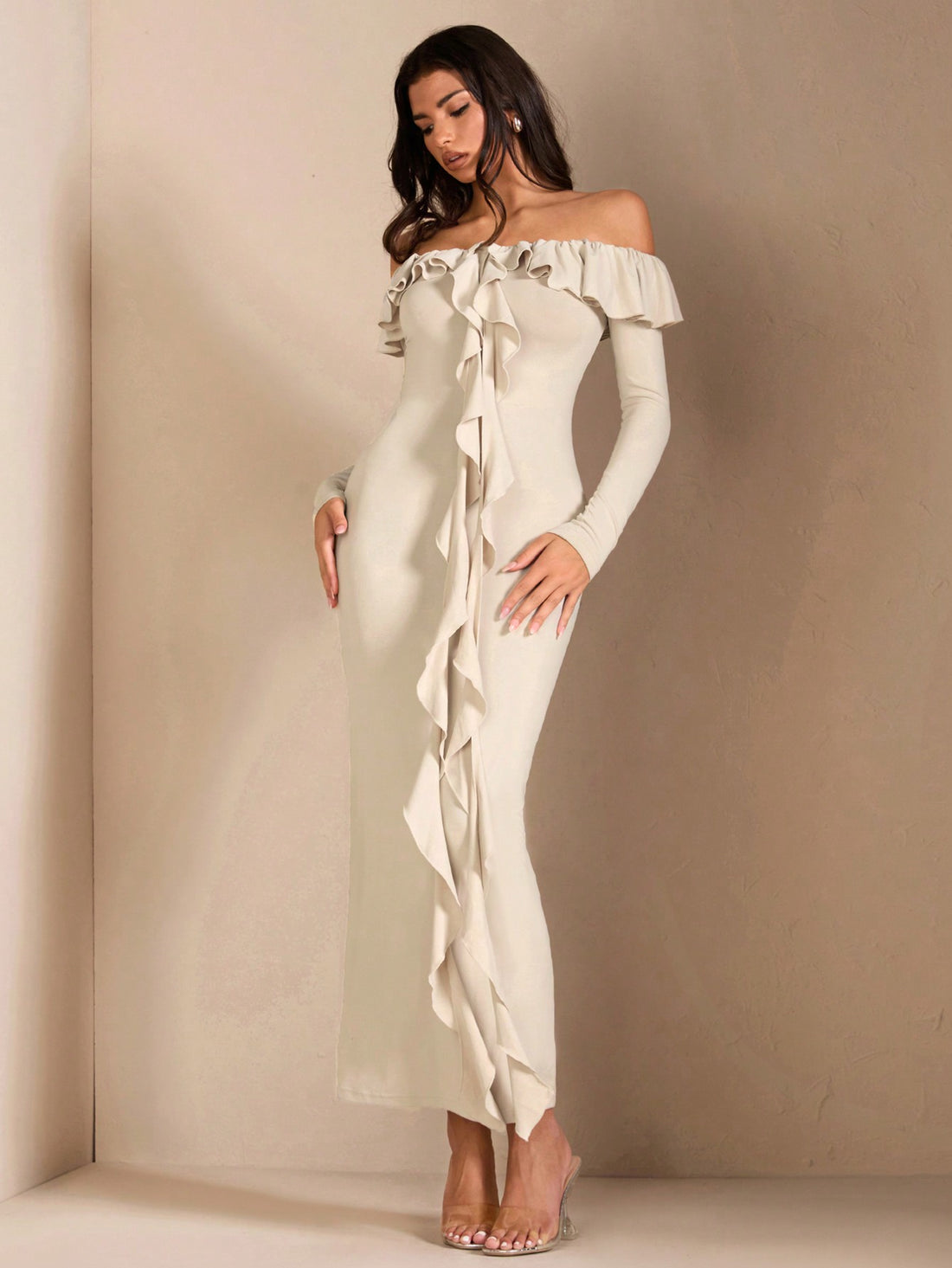 Get ready for a chic and flirty look with our Ruffled Off-Shoulder Dress for beach parties and romantic evenings. With its playful ruffles and alluring off-shoulder design, this dress is perfect for making a statement. Featuring long sleeves for versatility, it's the perfect addition to your wardrobe.