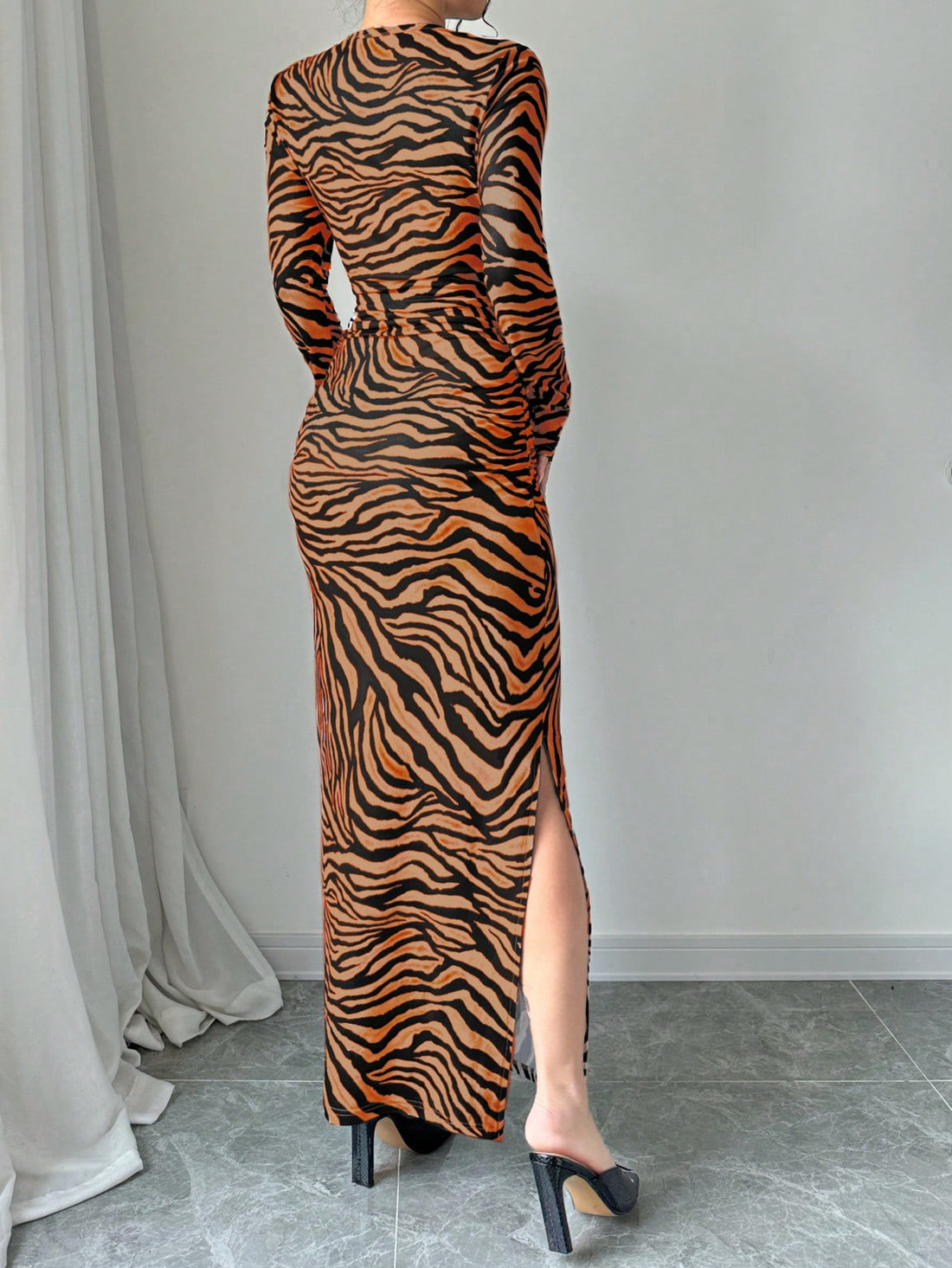 Elevate your style with our Chic Long Sleeve Knitted Dress. Crafted with effortless elegance in mind, this dress will keep you looking and feeling chic all day long. With its long sleeves and soft knit fabric, you'll stay comfortable while exuding sophistication. Perfect for any occasion, from the office to a night out.