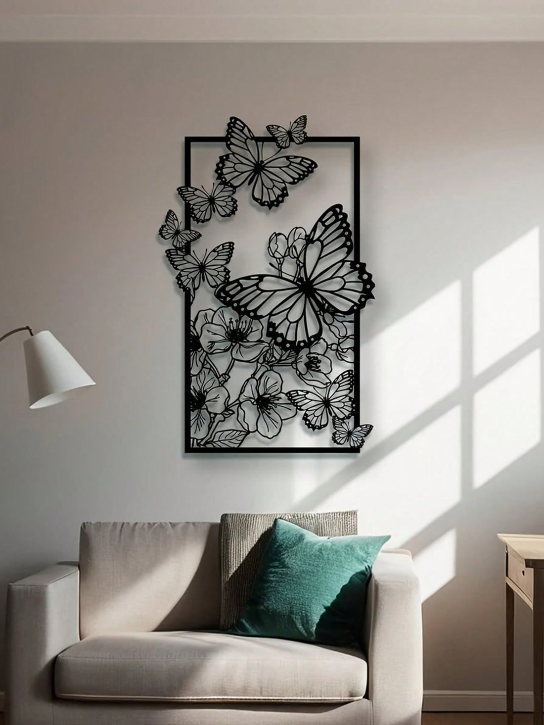 Enhance your home decor with this elegant Butterfly & Floral Metal Wall Sculpture. Delicate and modern, it adds a unique touch to any wall. Perfect for animal lovers, it also makes a thoughtful gift. Fluttering butterflies and blooming flowers make this sculpture a beautiful addition to any space.