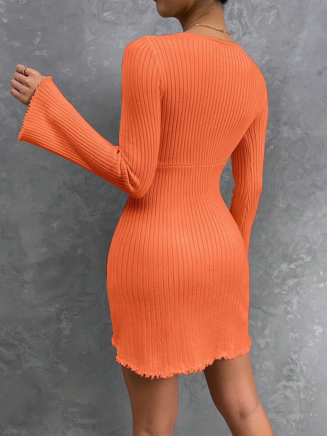 Step up your style game with our Chic Elegance V-Neck Bell Sleeve Tie-Front Sweater Dress for Autumn/Winter. Featuring a flattering v-neck and trendy bell sleeves, this dress is perfect for any occasion. Stay warm and stylish this season with our cozy sweater dress.