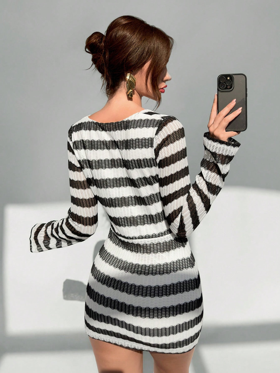 Crafted with a chic striped design and a soft fuzzy fabric, this mini dress is a trendy addition to any wardrobe. The mock neck adds a touch of sophistication, while the mini length allows for versatile styling options. Stay stylish and comfortable in this must-have dress.