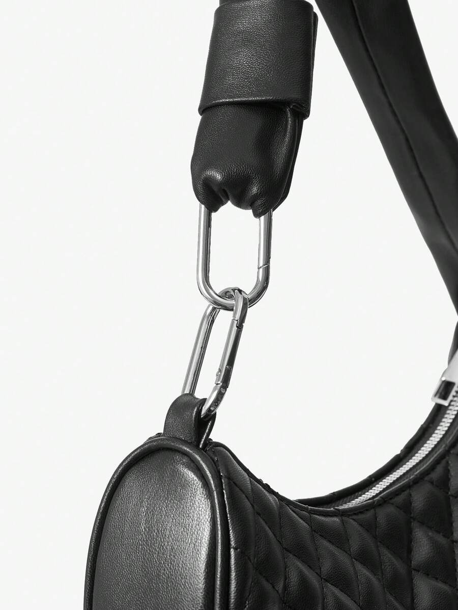 Close-up view of stylish rivet plaid shoulder bag with metal buckle - trendy women's underarm bag with plaid pattern, rivet accents, metal buckle for everyday style