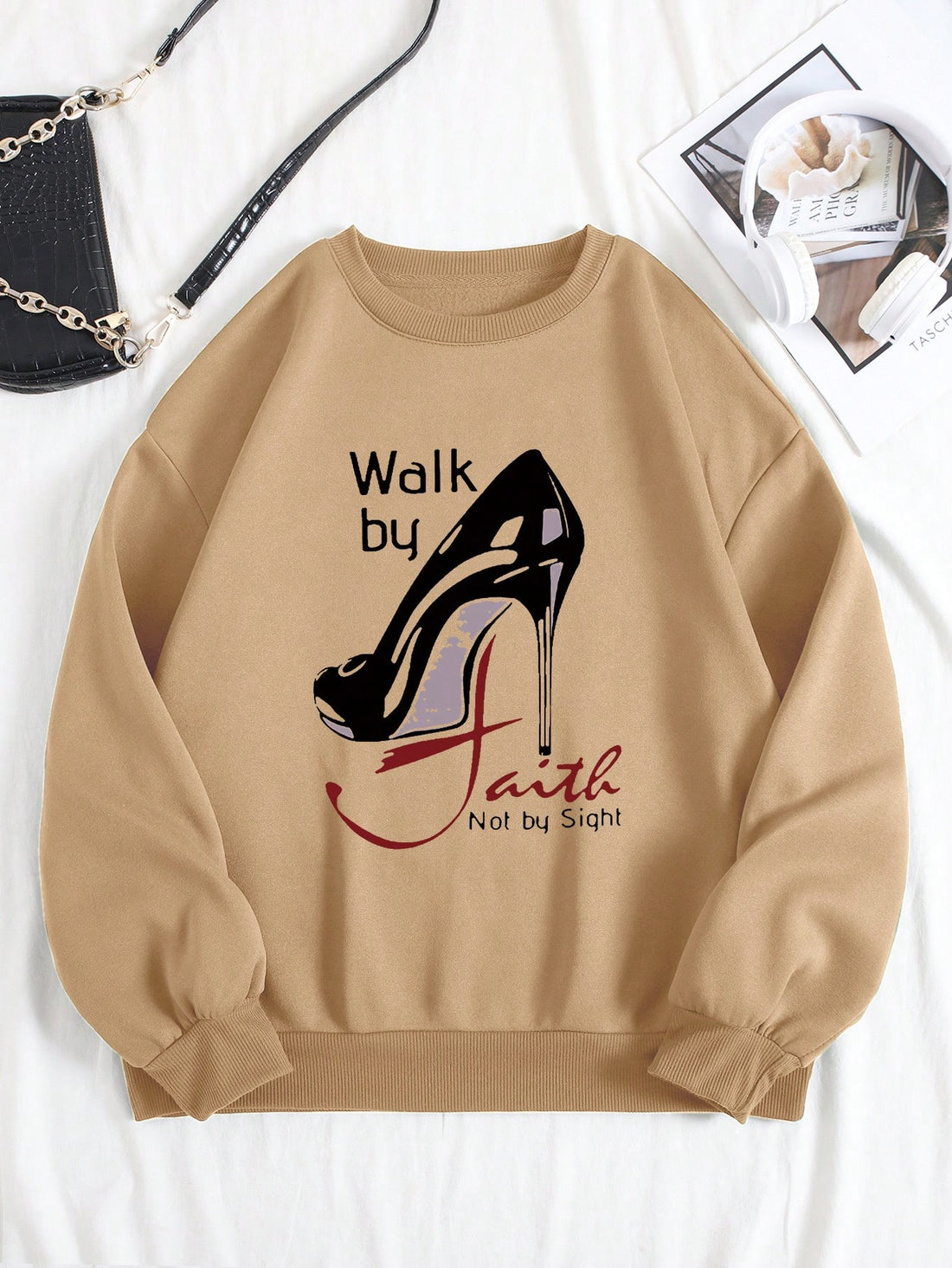 Stay stylish and snug this fall and winter with our Chic & Cozy sweatshirt. Featuring a graphic print design, this sweatshirt will keep you looking and feeling good. Made with quality materials, it keeps you warm while making a statement. Elevate your wardrobe and stay comfortable all season long.