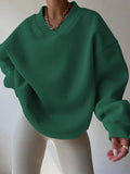 Front view of Casual V-Neck Drop Shoulder Loose Fit Sweatshirt for Women - Perfect for Back to School and Graduation in Green color