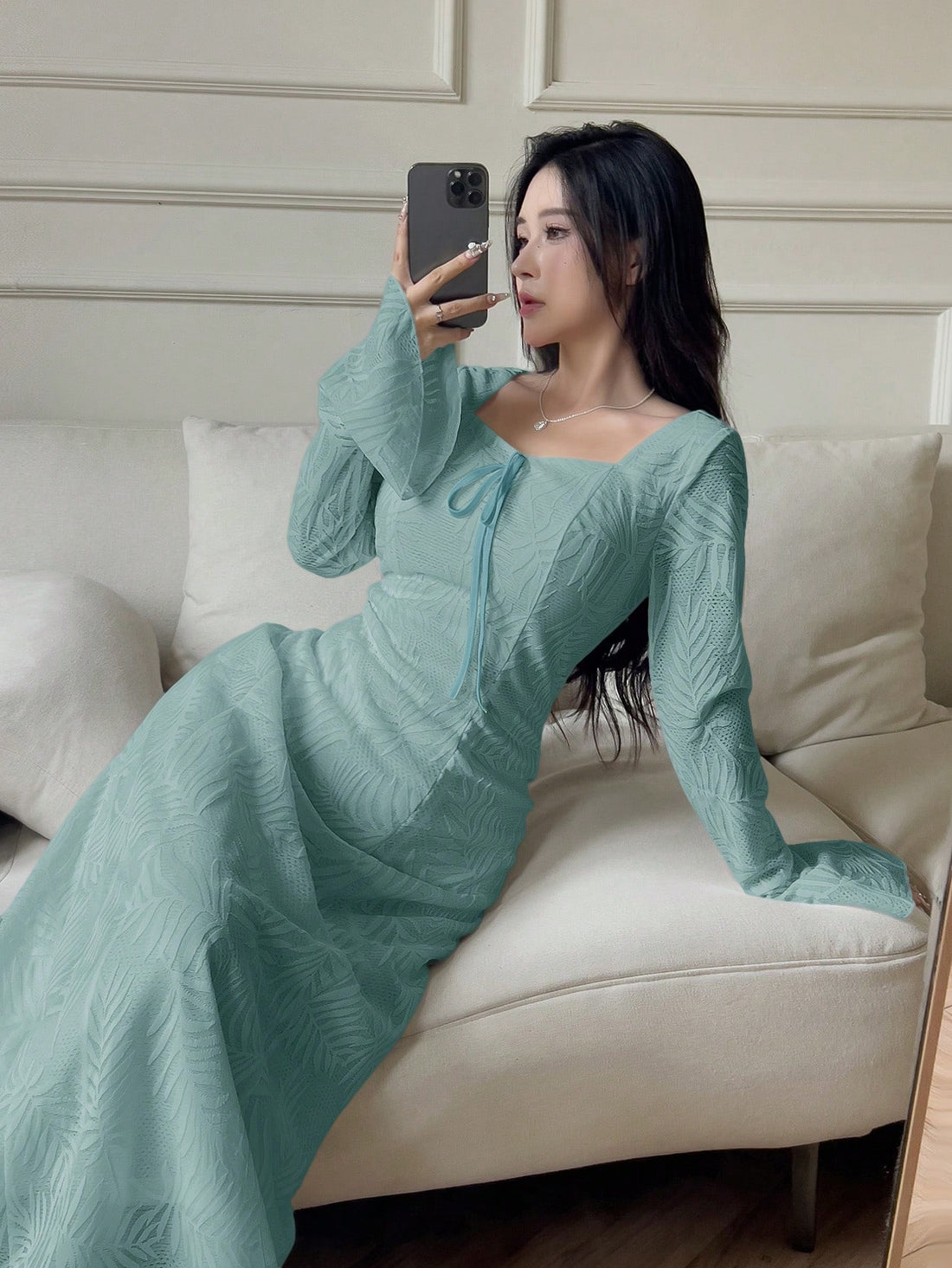 Unleash your inner fashionista with our Elegant Arabic Style V-Neck Long Sleeve Dress. With a front tie and stunning floral print, this dress adds a touch of sophistication to your wardrobe. Perfect for any occasion, you'll feel confident and stylish wherever you go.