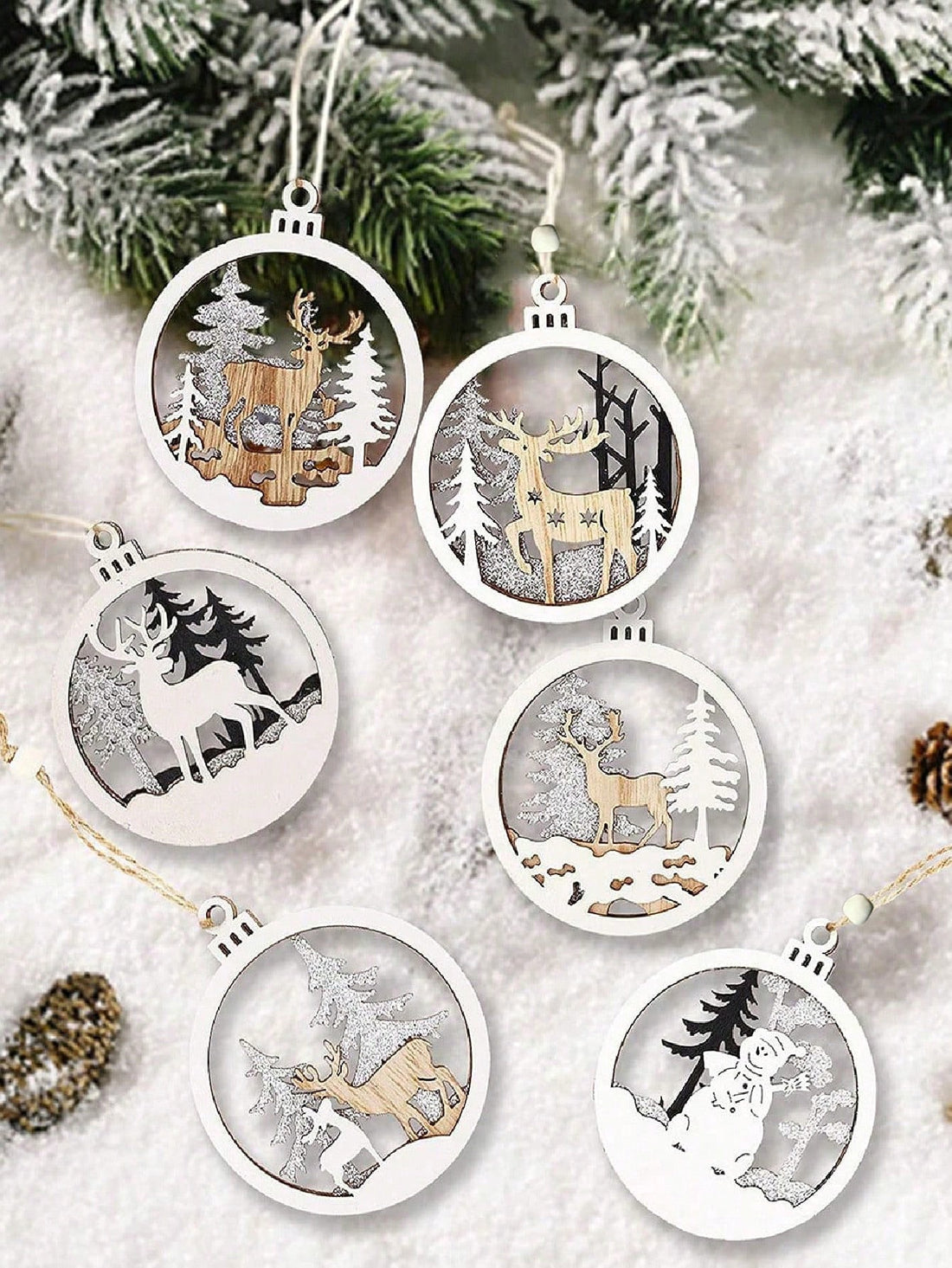 Enhance your holiday decor with Festive Charm, a 6-piece wooden Christmas tree ornament set. Made from high-quality materials, these ornaments are durable and add a touch of nature to your festive decorations. Perfect for any Christmas tree, these ornaments will bring warmth and charm to your home.