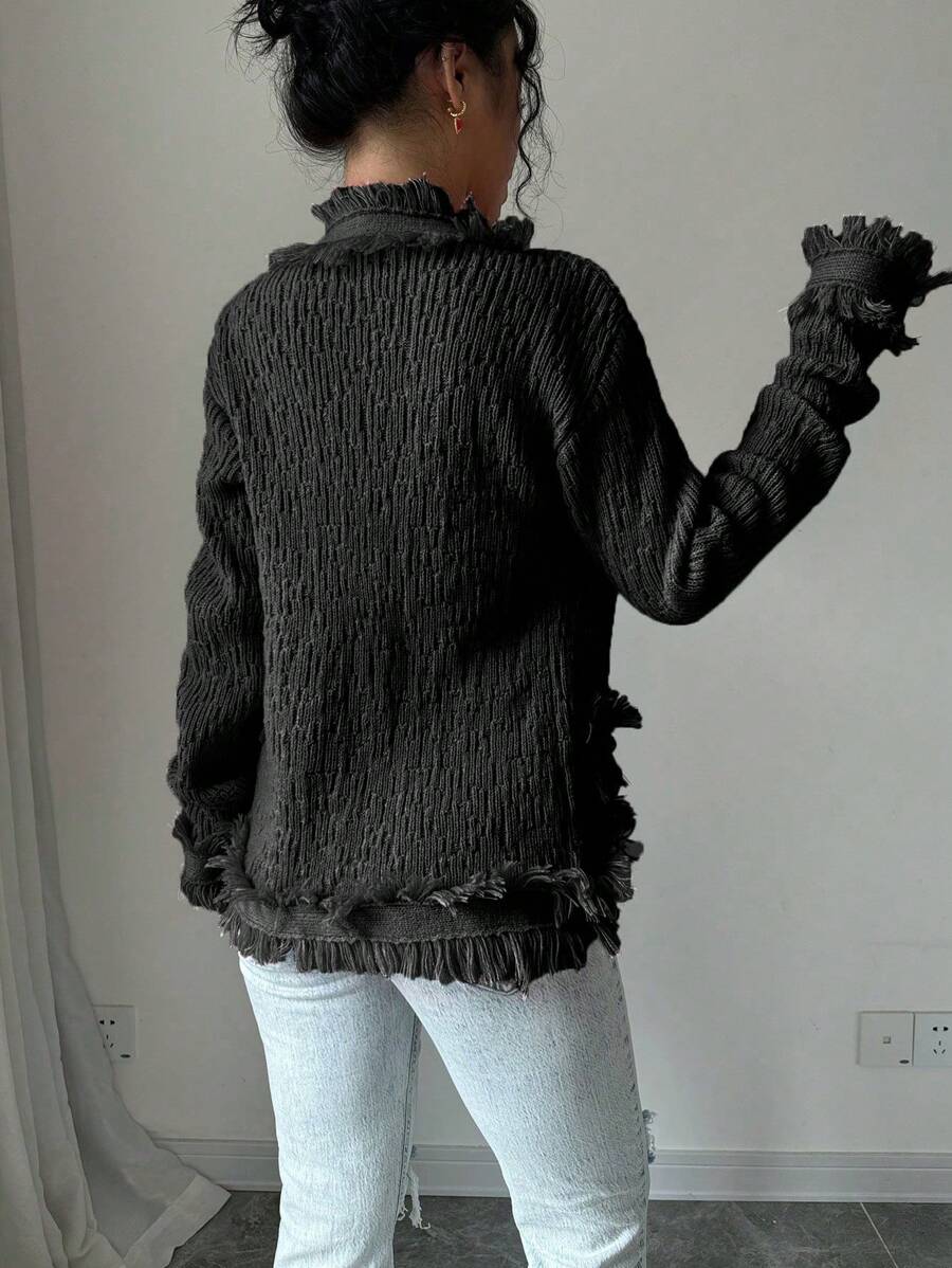 Elevate your layering essentials with this Fringe Trim Cardigan for Women, designed with a classic button-front closure and stylish fringe detailing for a chic, boho-inspired look. Crafted from soft knit fabric, this long sleeve sweater offers cozy warmth without sacrificing comfort. Its relaxed fit makes it easy to layer over camisoles, tees, dresses, or blouses for effortless everyday style.