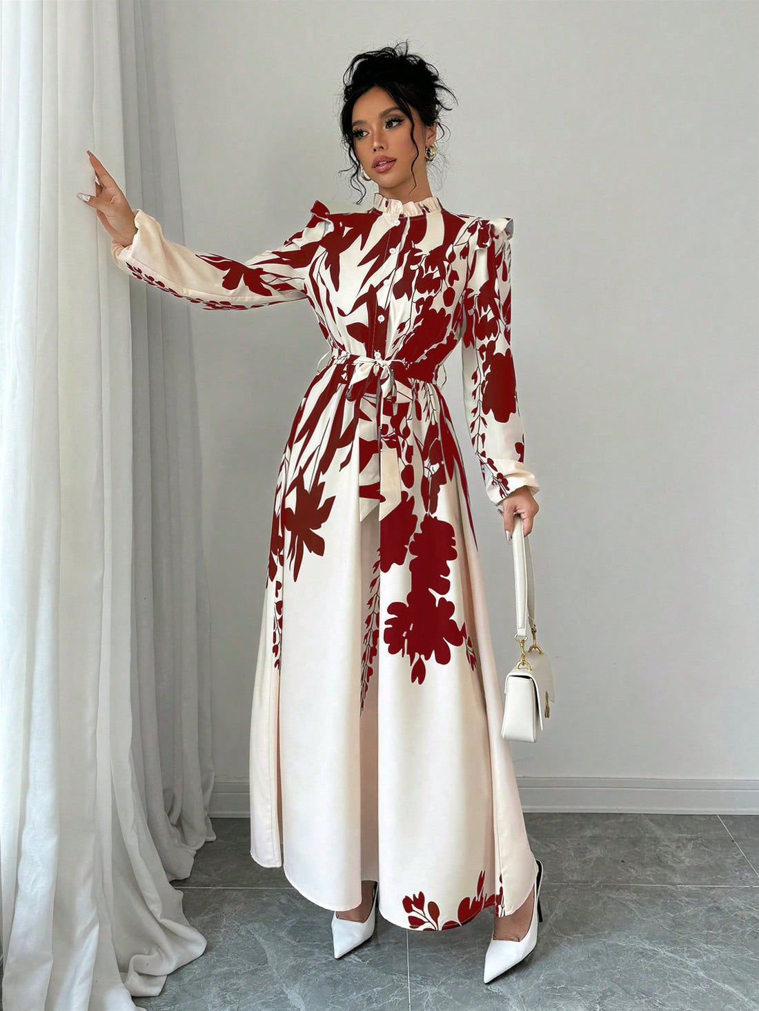 Stay chic in this burgundy floral maxi dress! The wrap style and cinched waist create a flattering silhouette, while the button details add a touch of detail. Perfect for any occasion, this dress will have you looking and feeling fabulous!