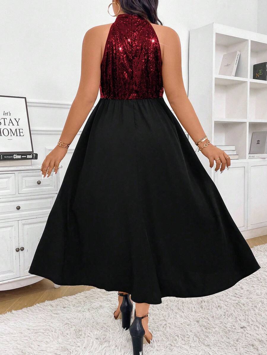 Shine bright like the sequin queen you are in this show-stopping plus-size halter maxi dress! The asymmetric hem adds an unexpected twist that keeps things interesting, while the halter neckline flatters and frames beautifully. Perfect for nights out, celebrations, or whenever you want to turn heads and feel absolutely fabulous. This dress is your ticket to looking effortlessly glamorous while staying comfortable and confident.