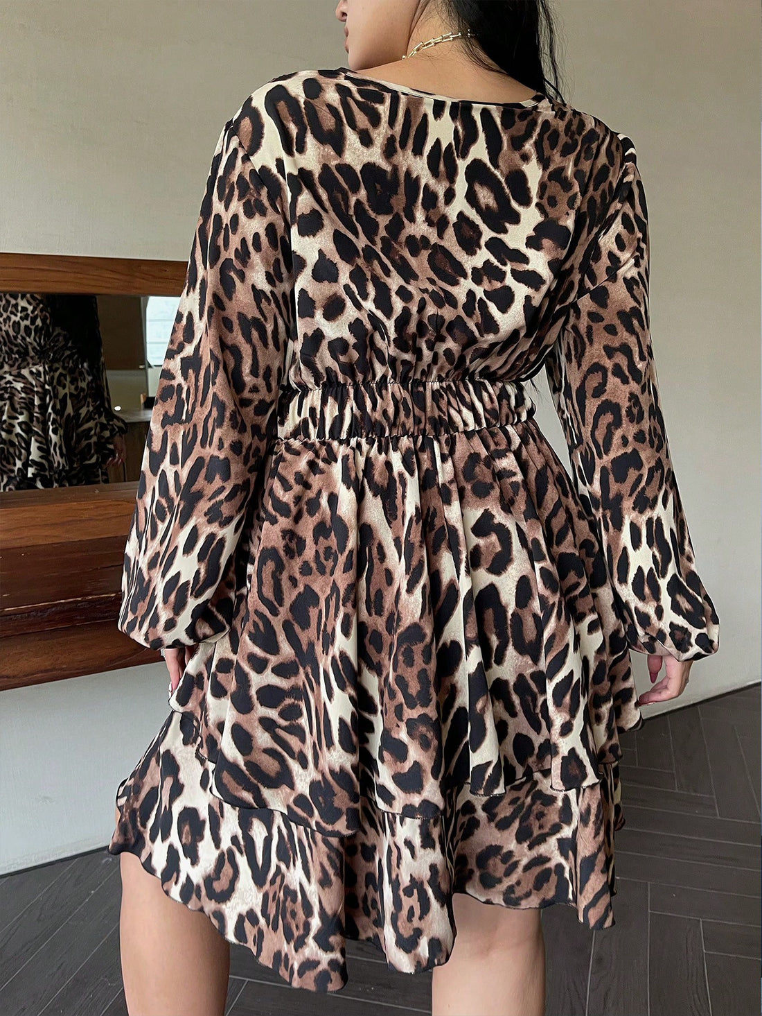 Elevate your style game with our Plus Size Leopard Print V-Neck Wrap Dress! This trendy dress features a flattering wrap design, v-neckline, and long sleeves for added sass. Perfect for any occasion, this dress will have you feeling confident and stylish all day long! (Rawr!)